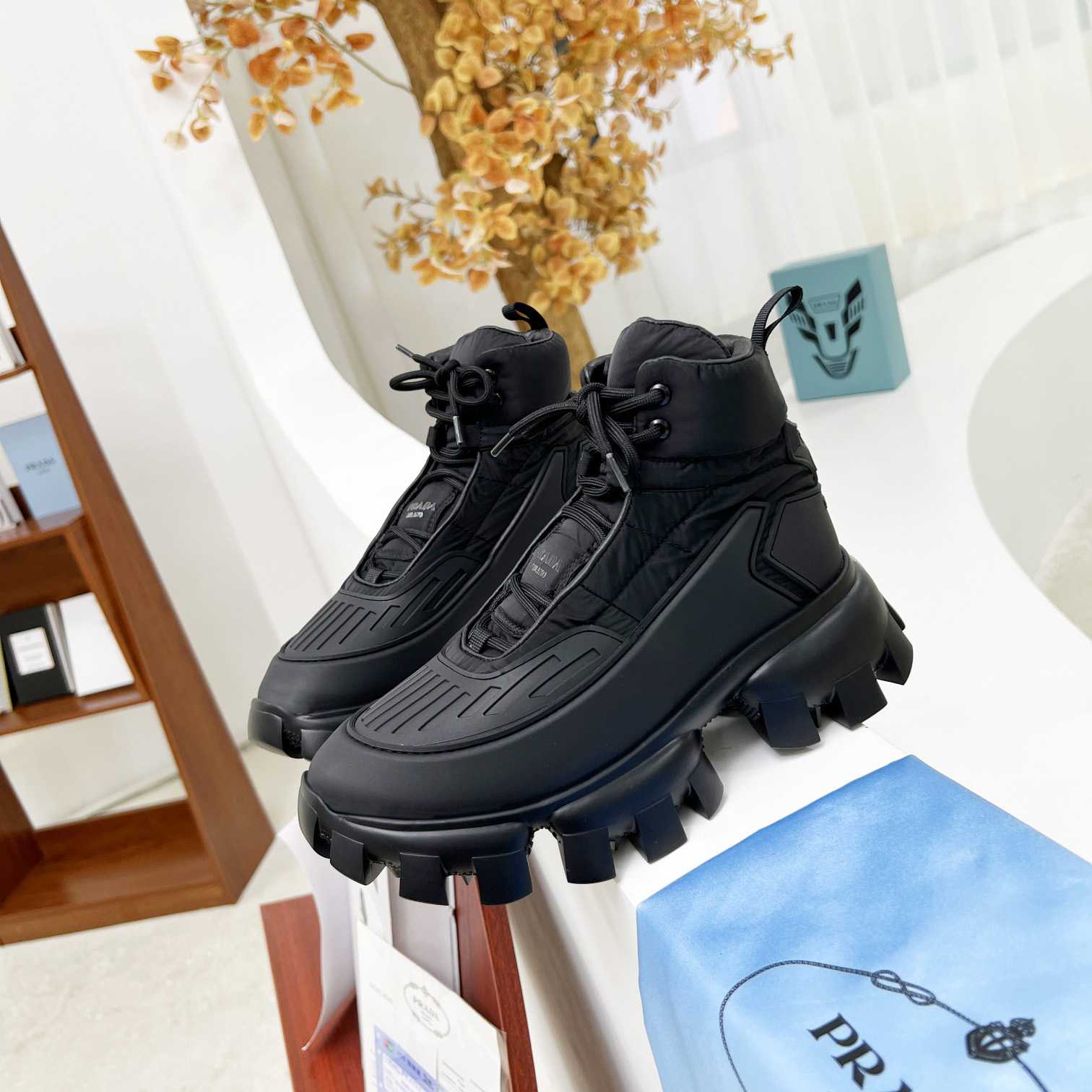 Prada Cloudbust Thunder High-Top Sneakers - FashionPlug