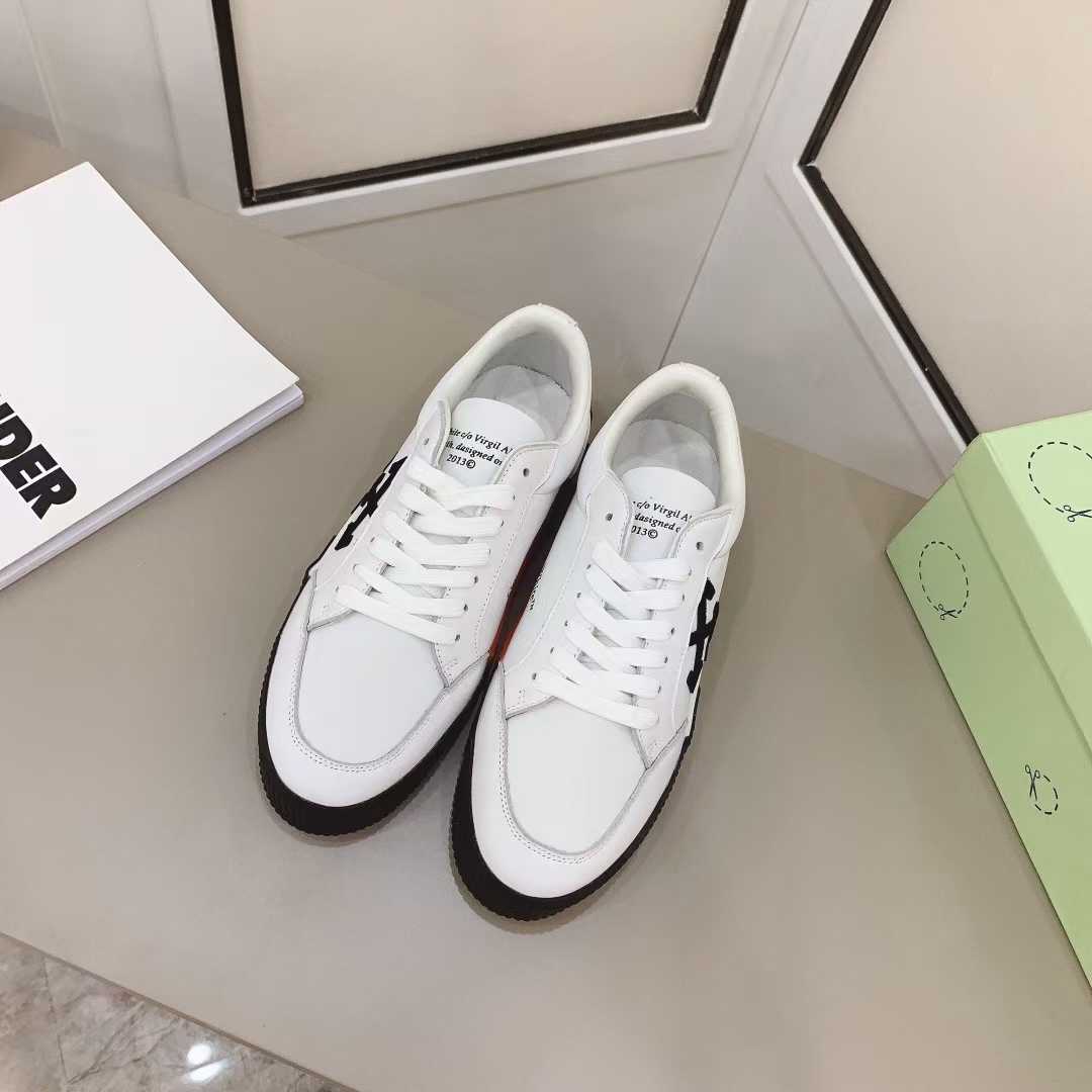 Off White Canvas Vulcanized Low Sneakers - FashionPlug