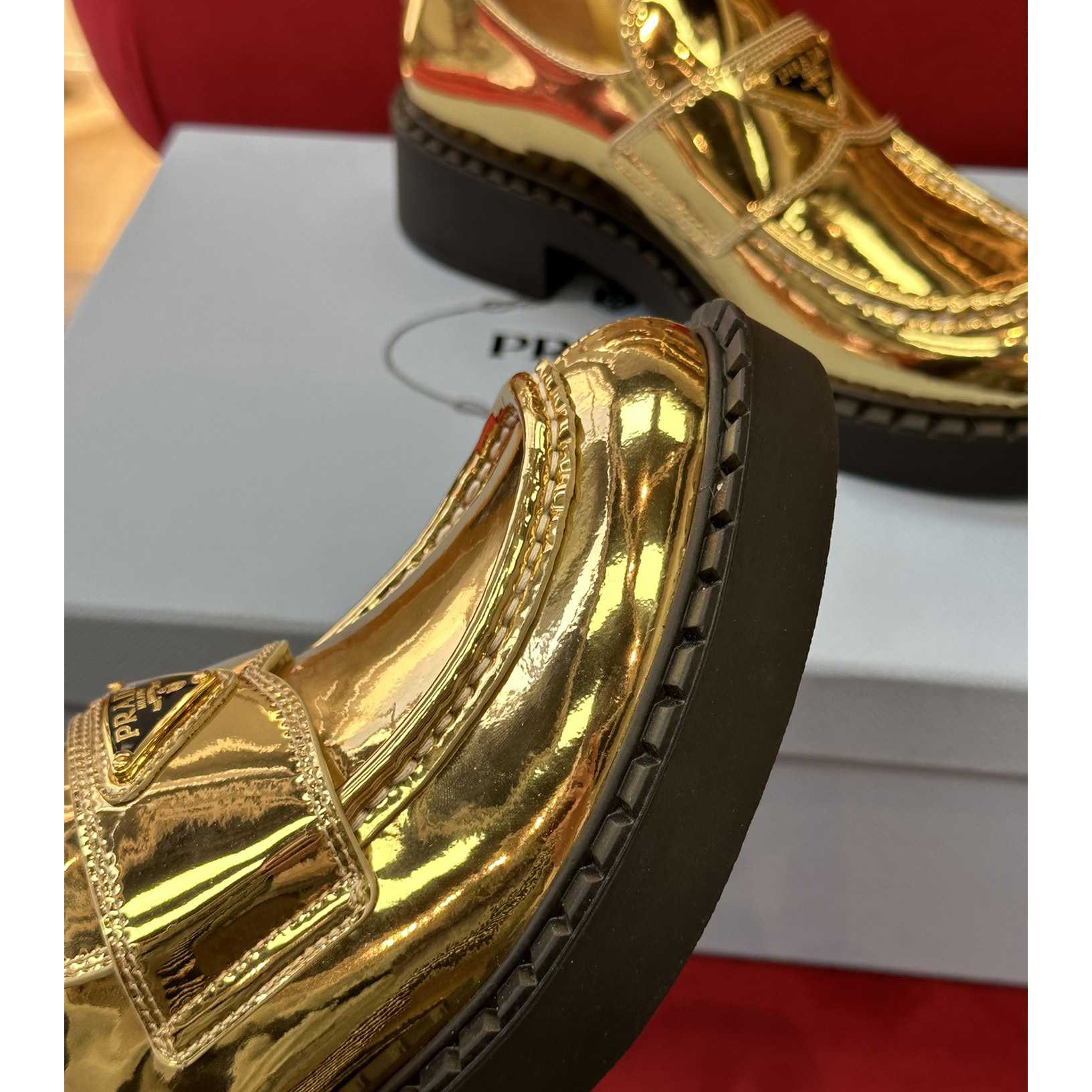 Prada Metallic Leather Loafers - FashionPlug