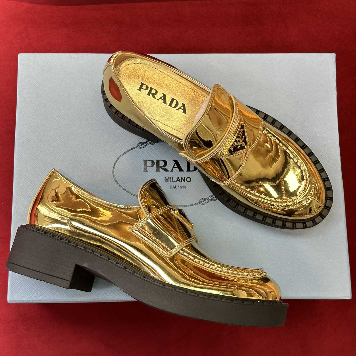 Prada Metallic Leather Loafers - FashionPlug