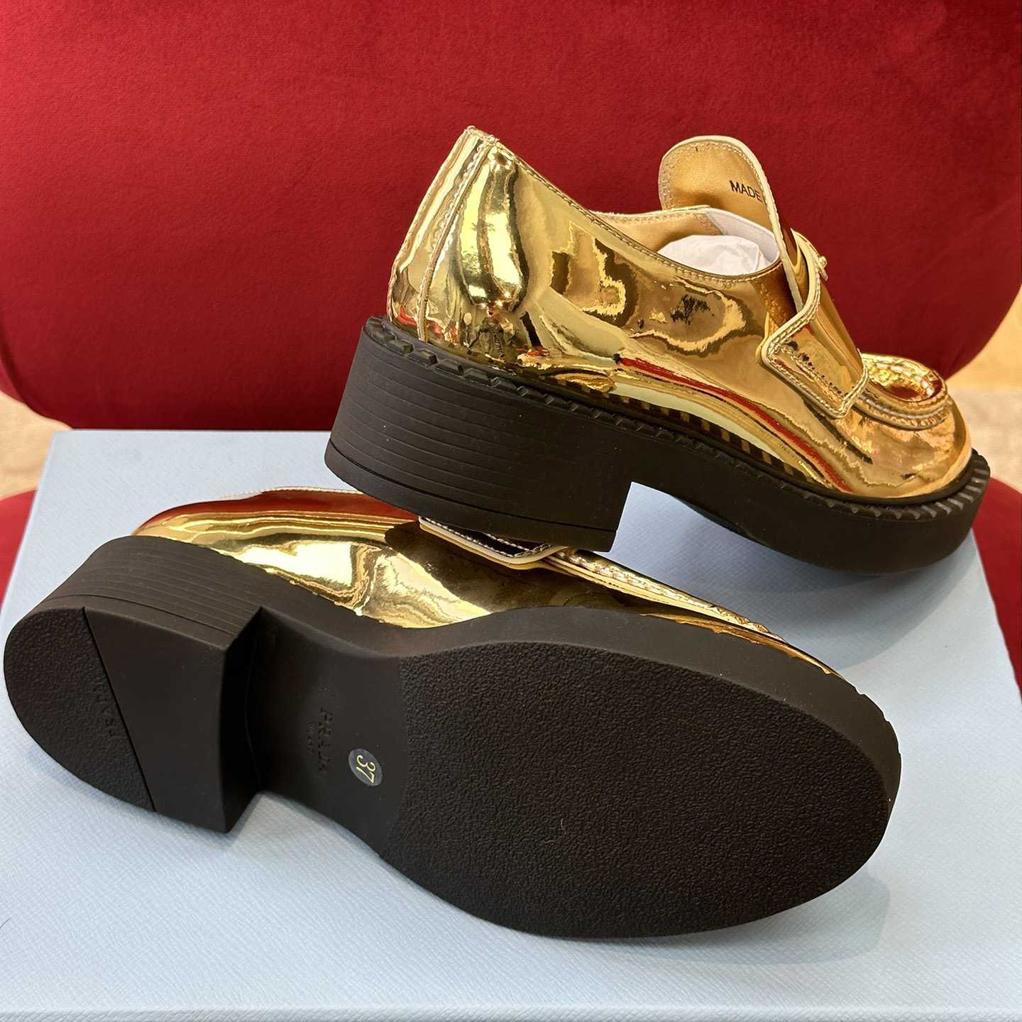 Prada Metallic Leather Loafers - FashionPlug