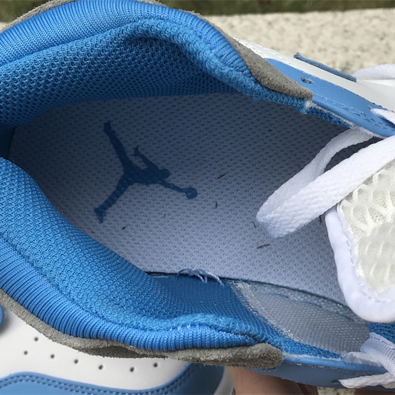 Air Jordan 1 Mid “University Blue” Sneaker    DX9276-100 - FashionPlug