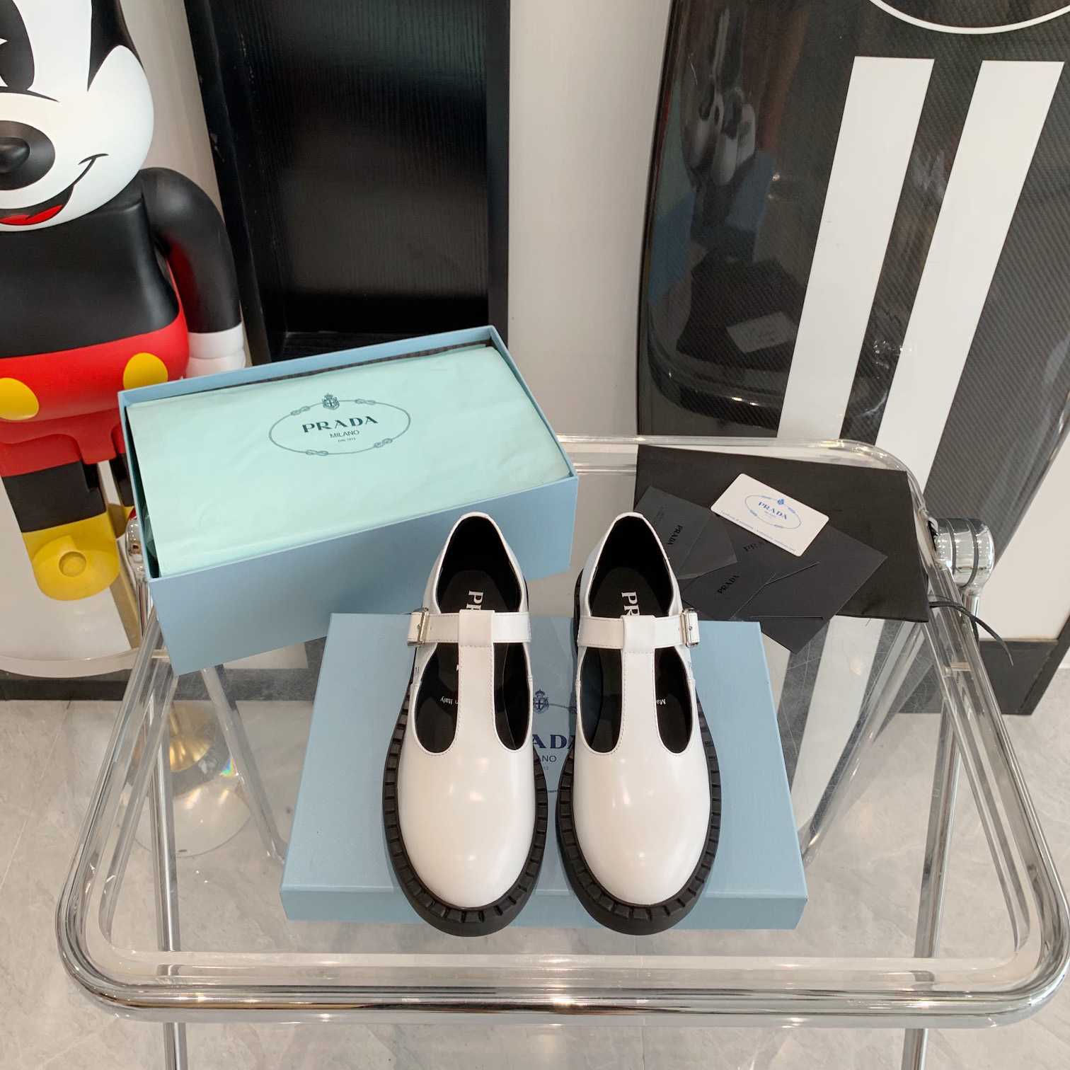Prada Brushed-Leather Mary Jane T-strap Shoes - FashionPlug