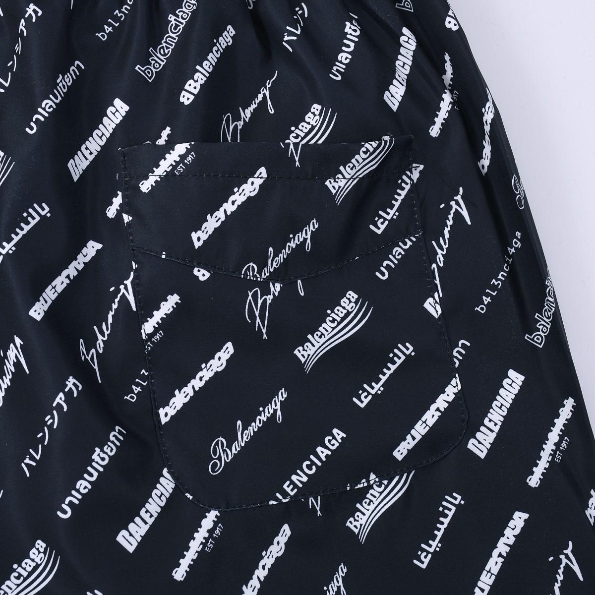 Balenciaga All-Over Logo Trousers - FashionPlug