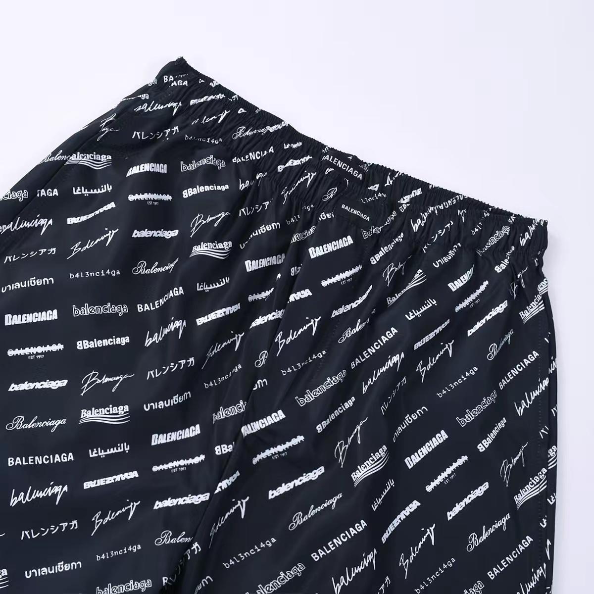 Balenciaga All-Over Logo Trousers - FashionPlug