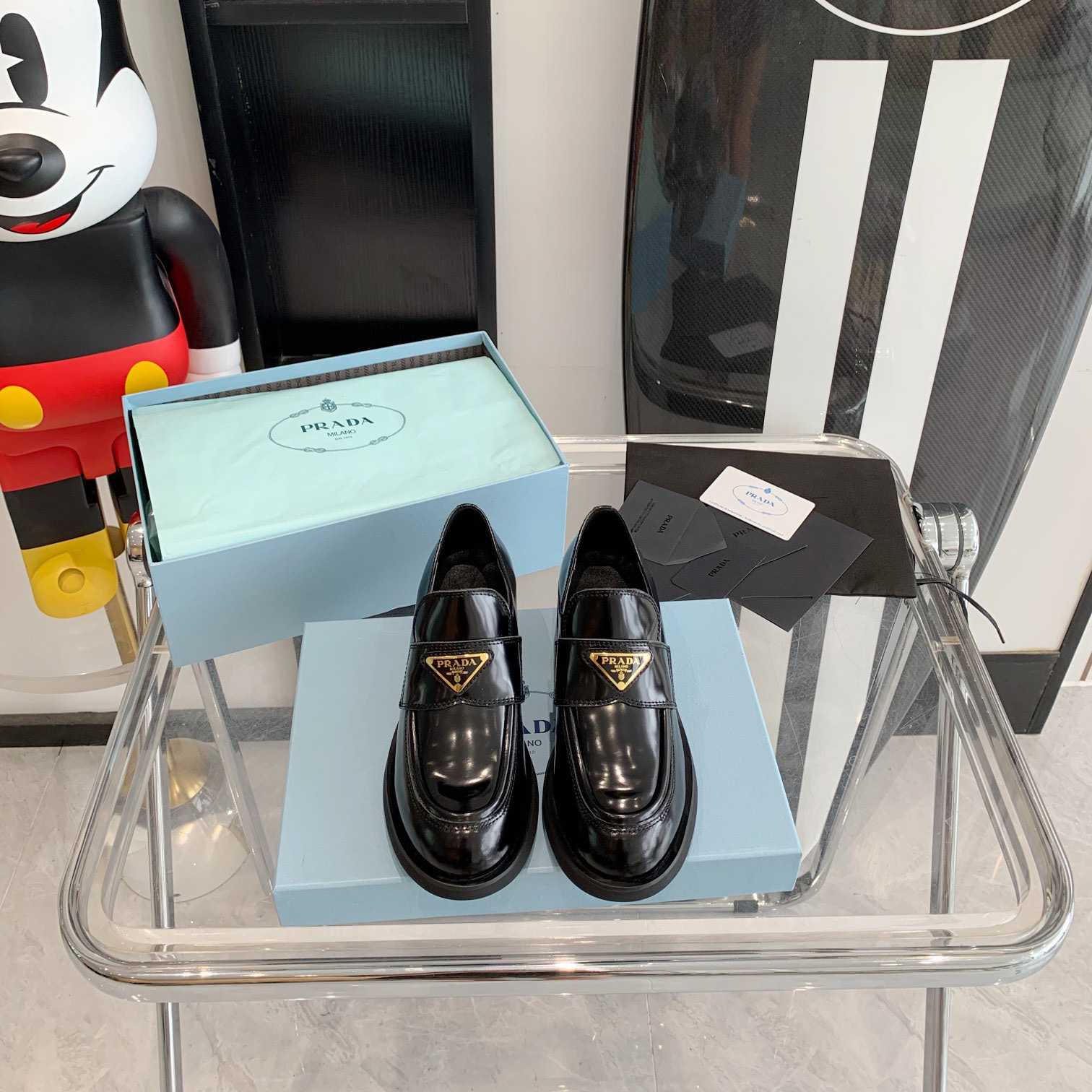 Prada Chocolate Brushed Leather Loafers - FashionPlug