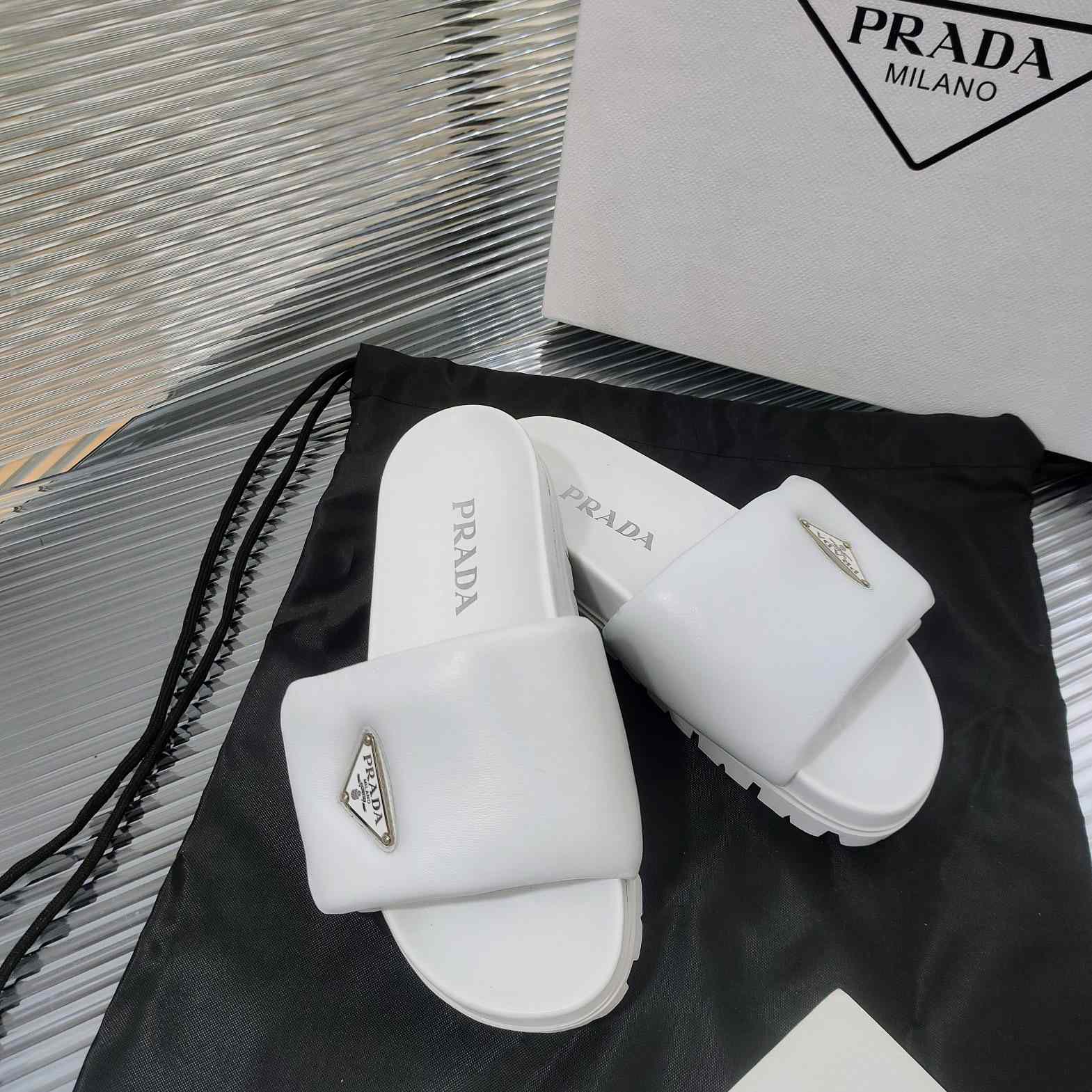 Prada Soft Padded Nappa Leather Slides - FashionPlug