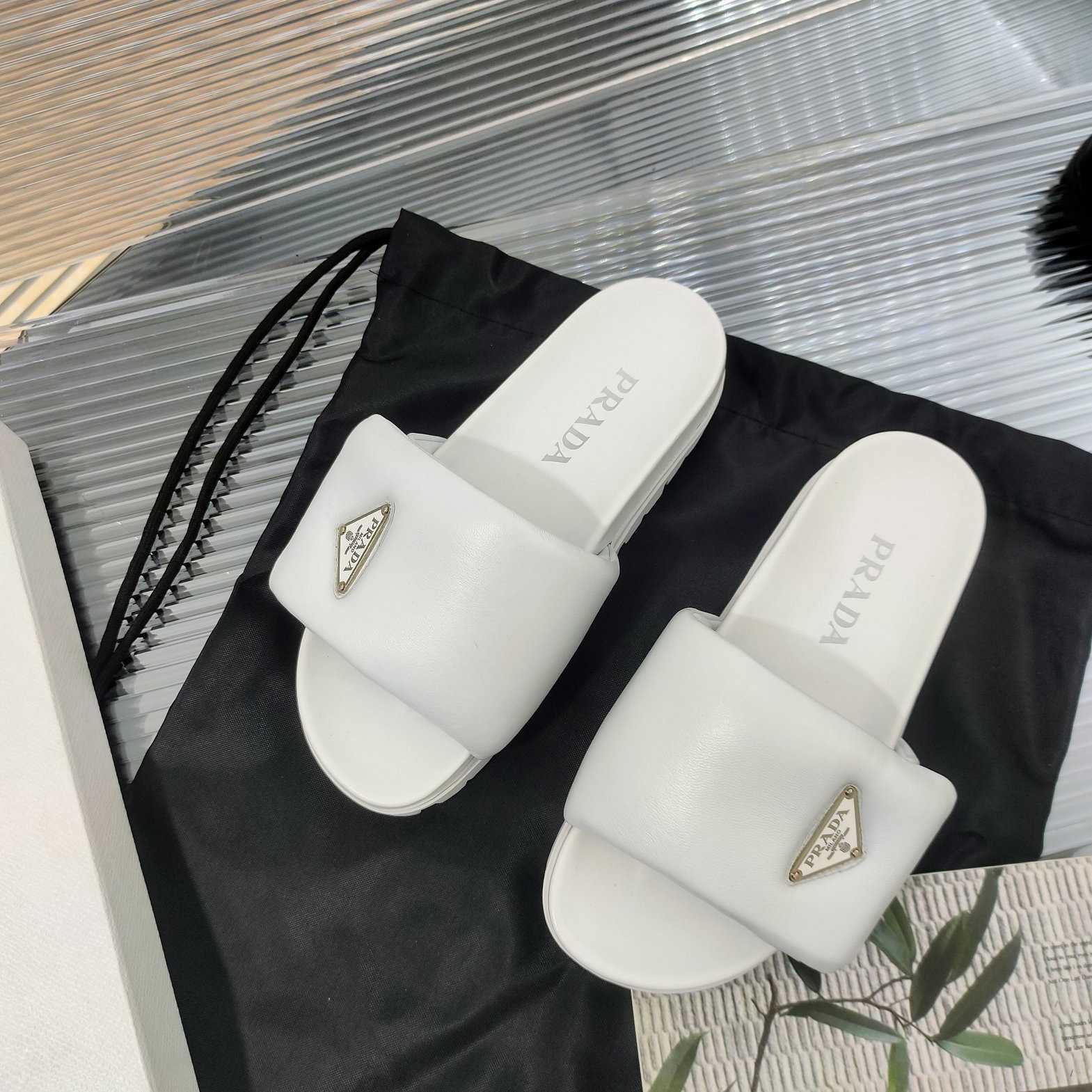 Prada Soft Padded Nappa Leather Slides - FashionPlug