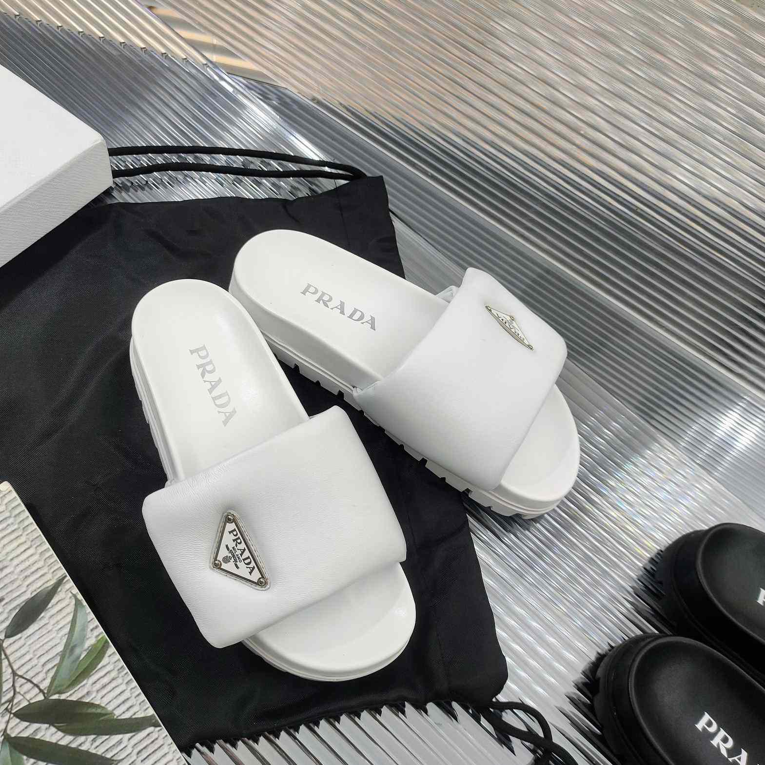Prada Soft Padded Nappa Leather Slides - FashionPlug