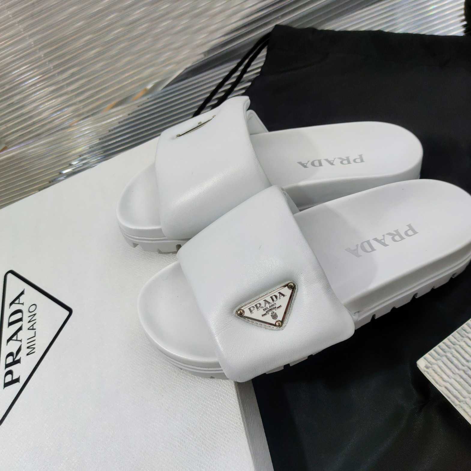 Prada Soft Padded Nappa Leather Slides - FashionPlug