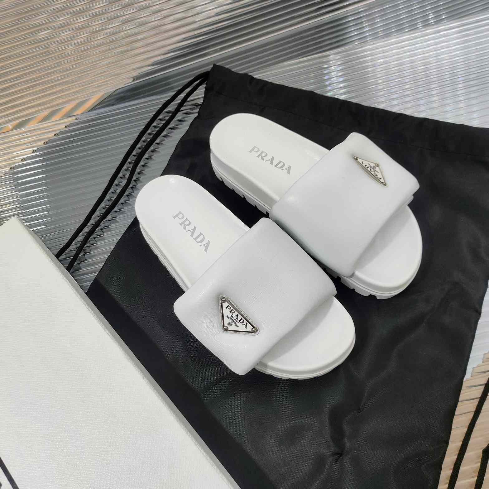 Prada Soft Padded Nappa Leather Slides - FashionPlug