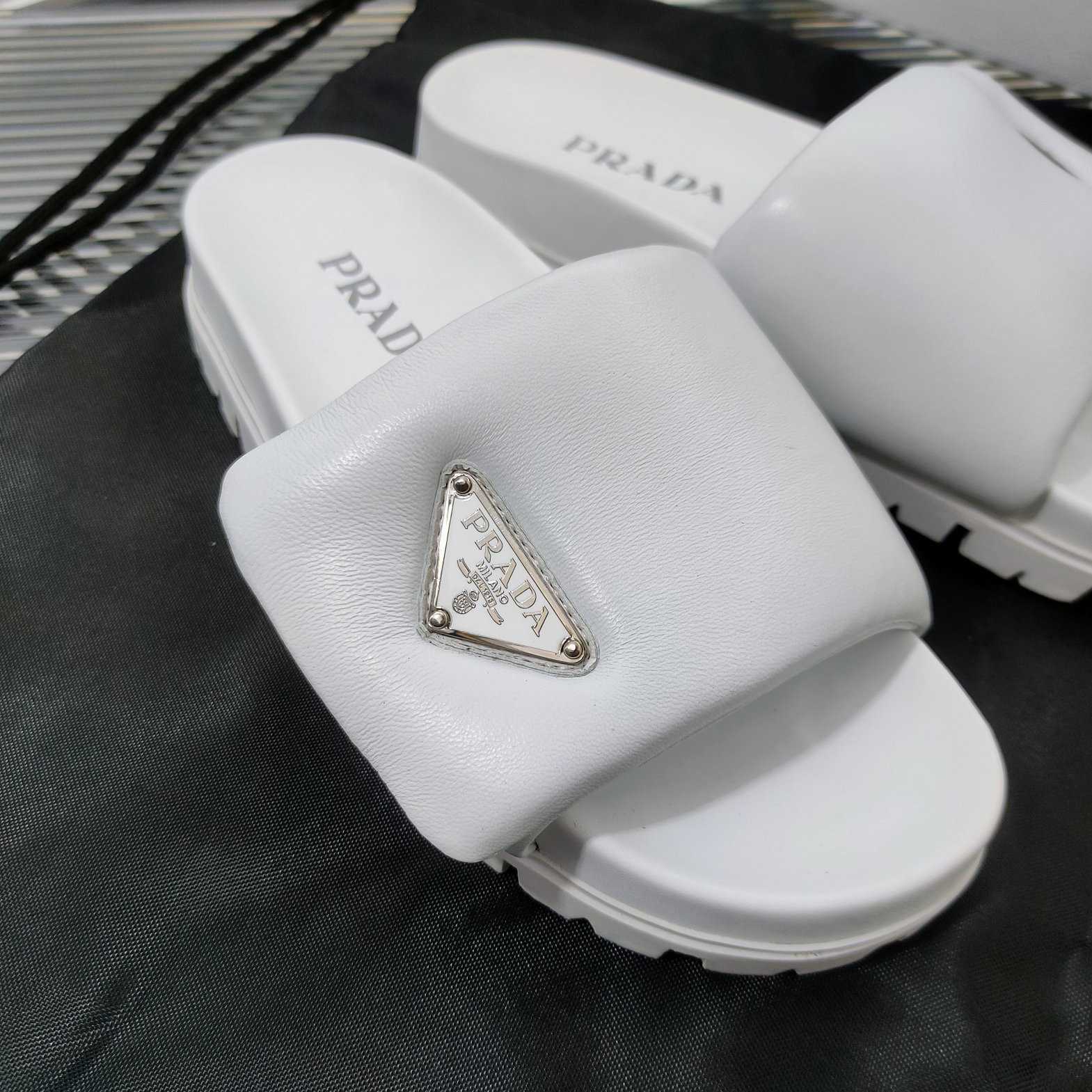 Prada Soft Padded Nappa Leather Slides - FashionPlug