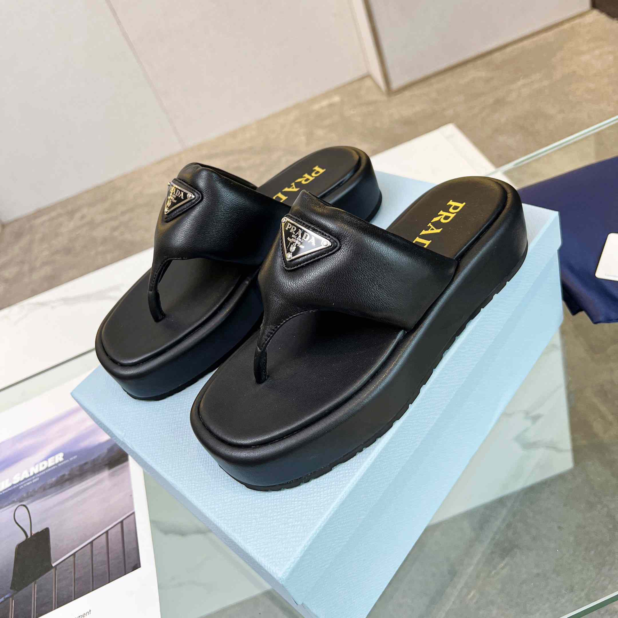 Prada Soft Padded Nappa Leather Thong Wedge Sandals - FashionPlug