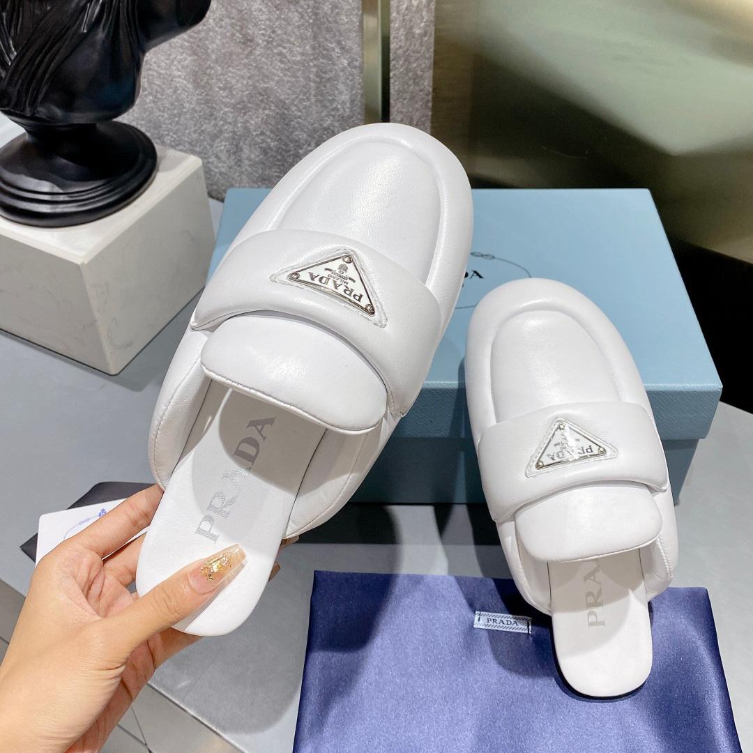 Prada Soft Padded Nappa Leather Sabots - FashionPlug