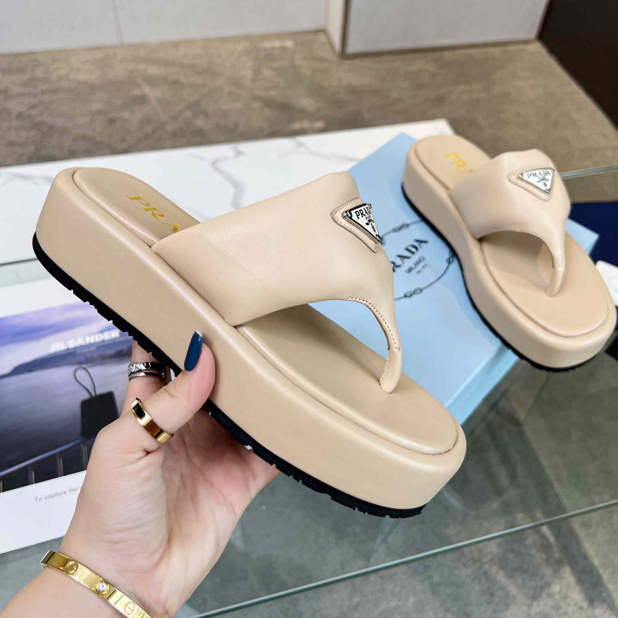 Prada Soft Padded Nappa Leather Thong Wedge Sandals - FashionPlug