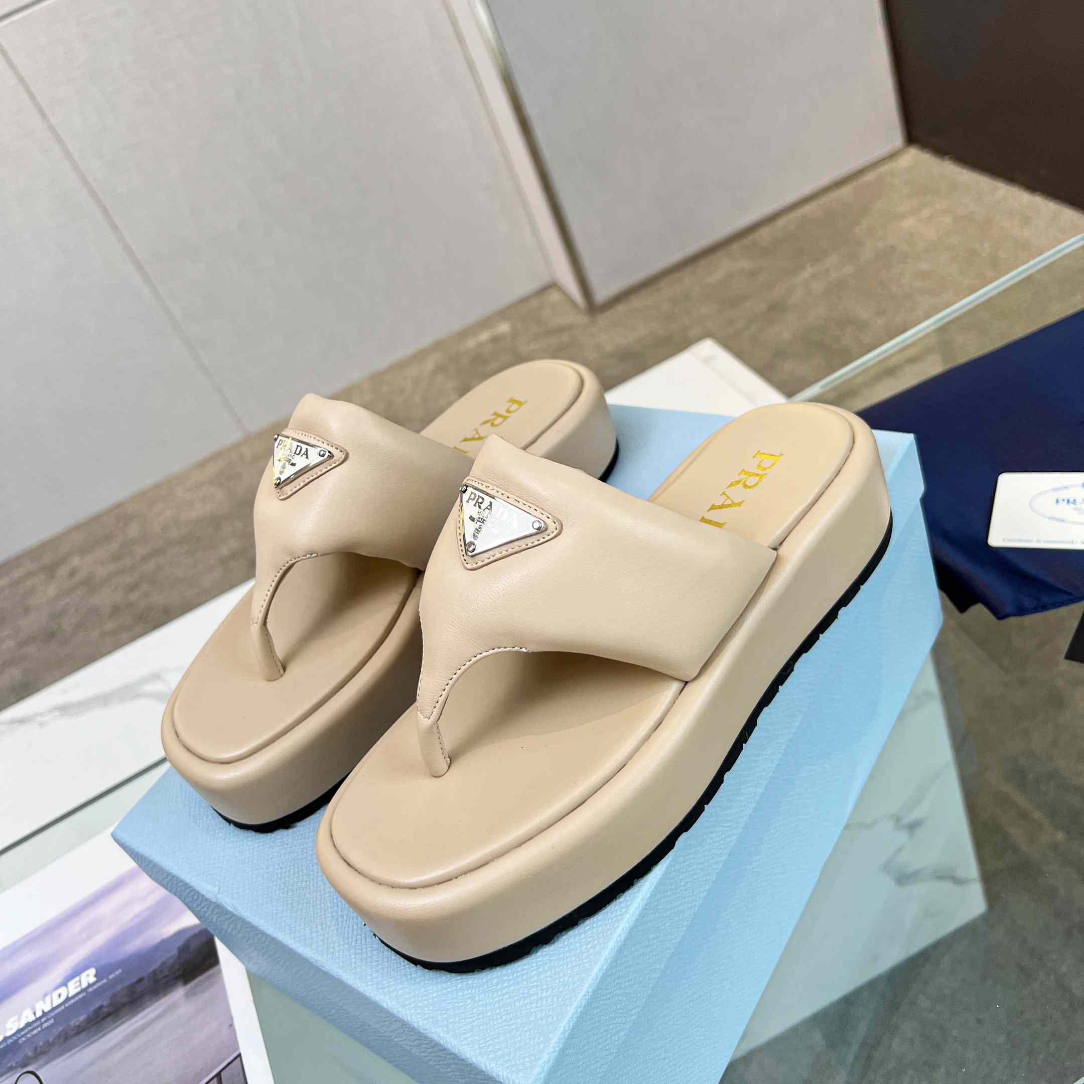 Prada Soft Padded Nappa Leather Thong Wedge Sandals - FashionPlug