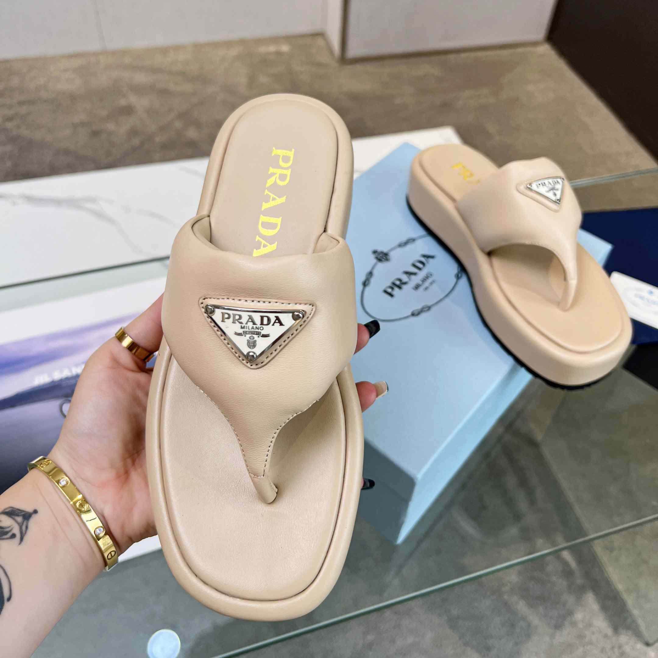 Prada Soft Padded Nappa Leather Thong Wedge Sandals - FashionPlug