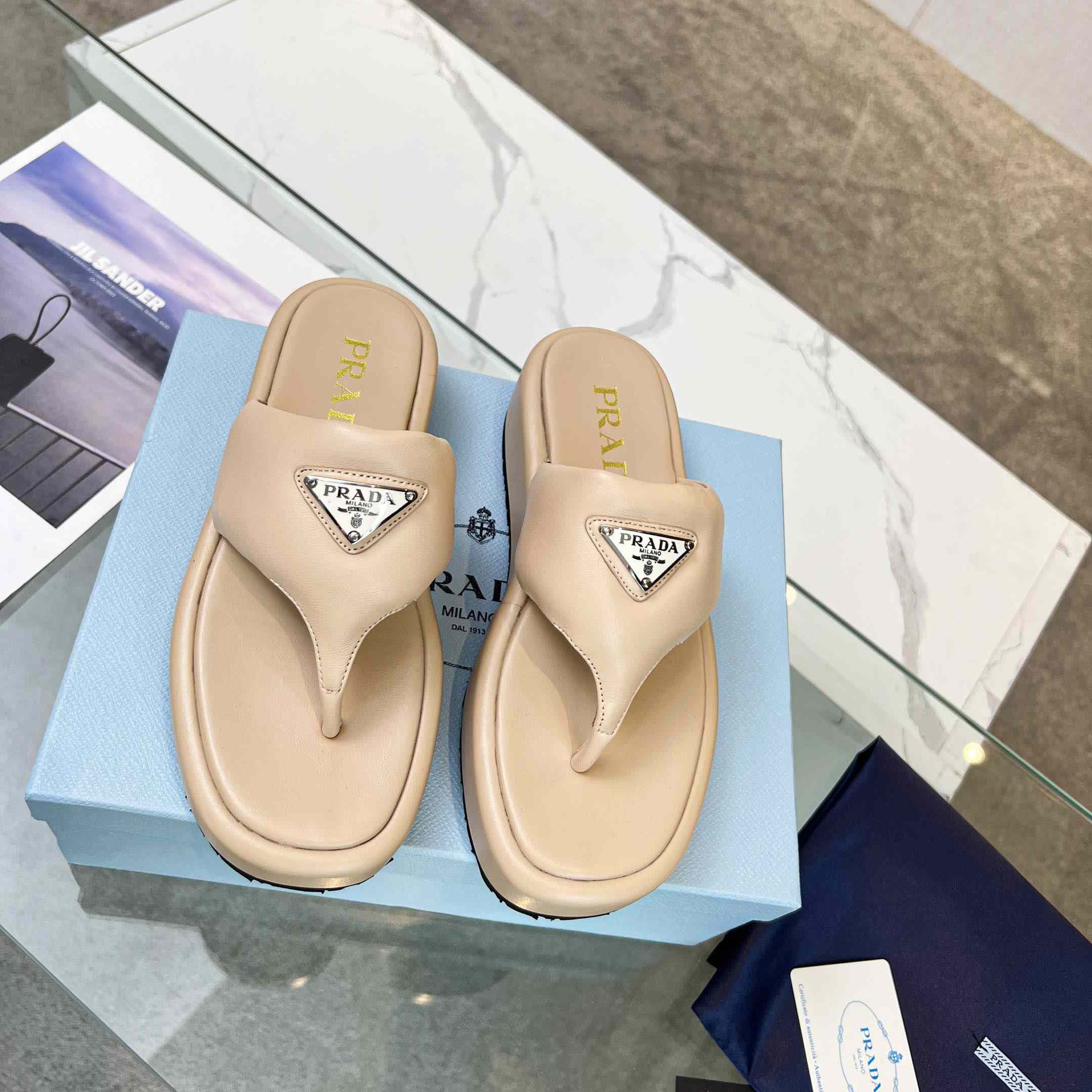 Prada Soft Padded Nappa Leather Thong Wedge Sandals - FashionPlug