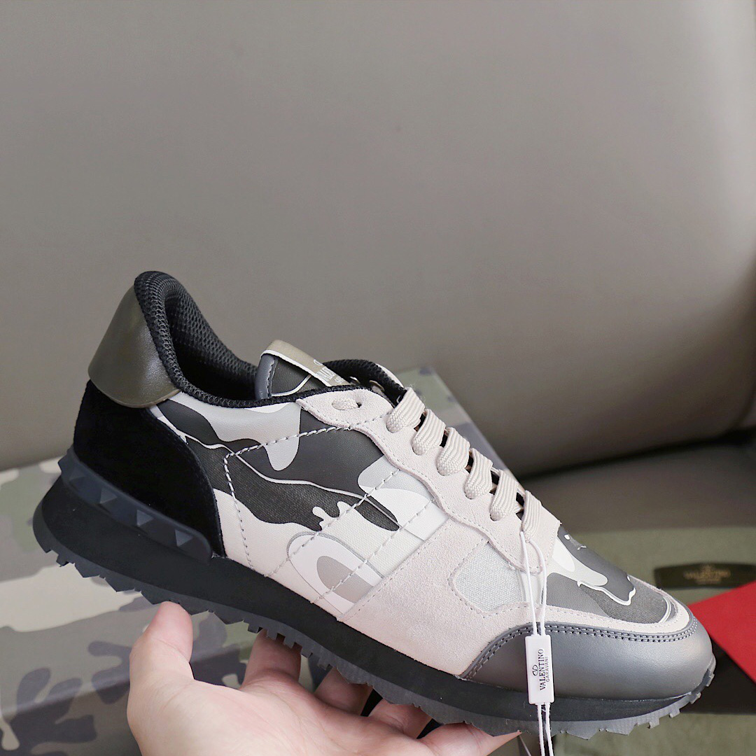 Valenti  Garavani Black & Gray Rockrunner Sneakers - FashionPlug