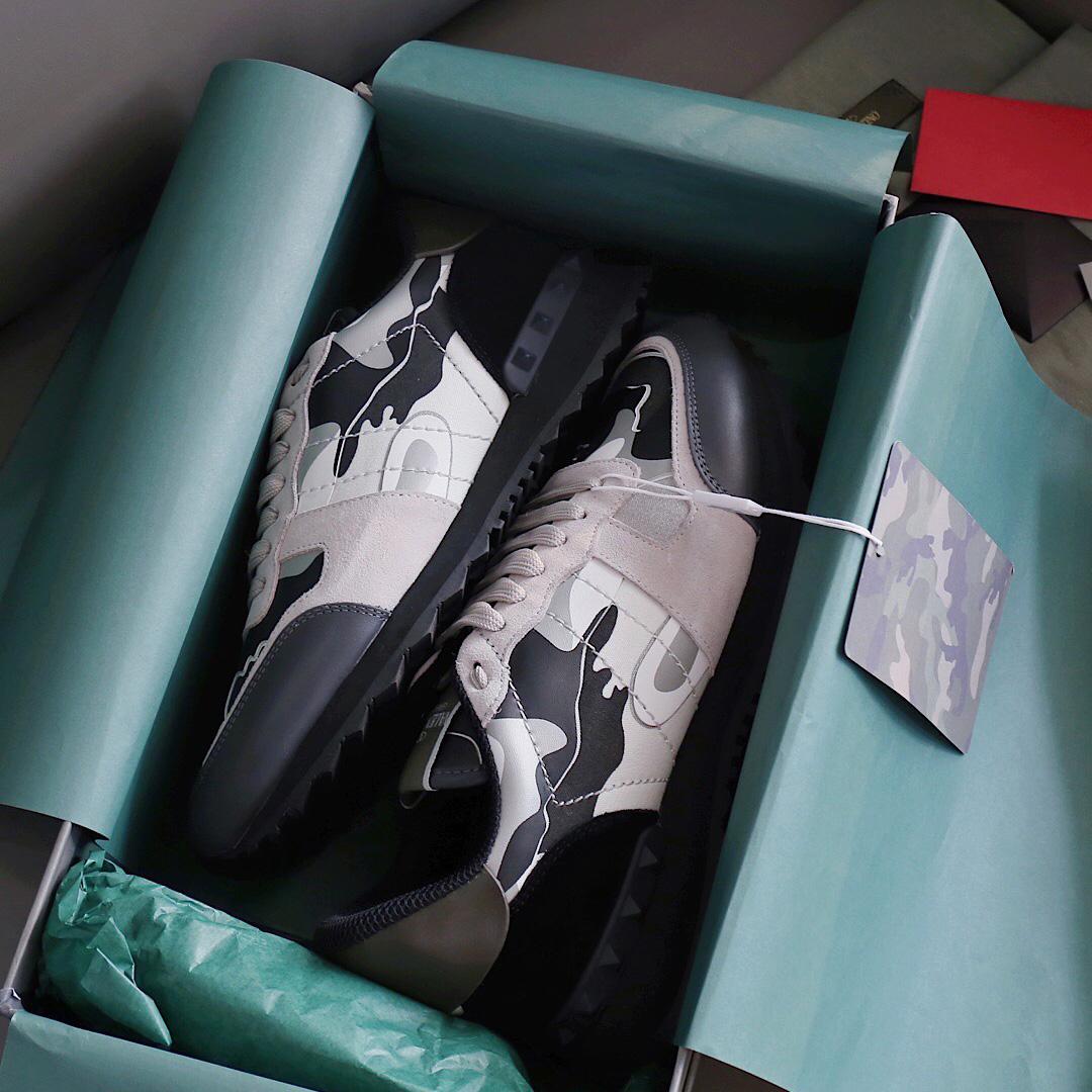 Valenti  Garavani Black & Gray Rockrunner Sneakers - FashionPlug