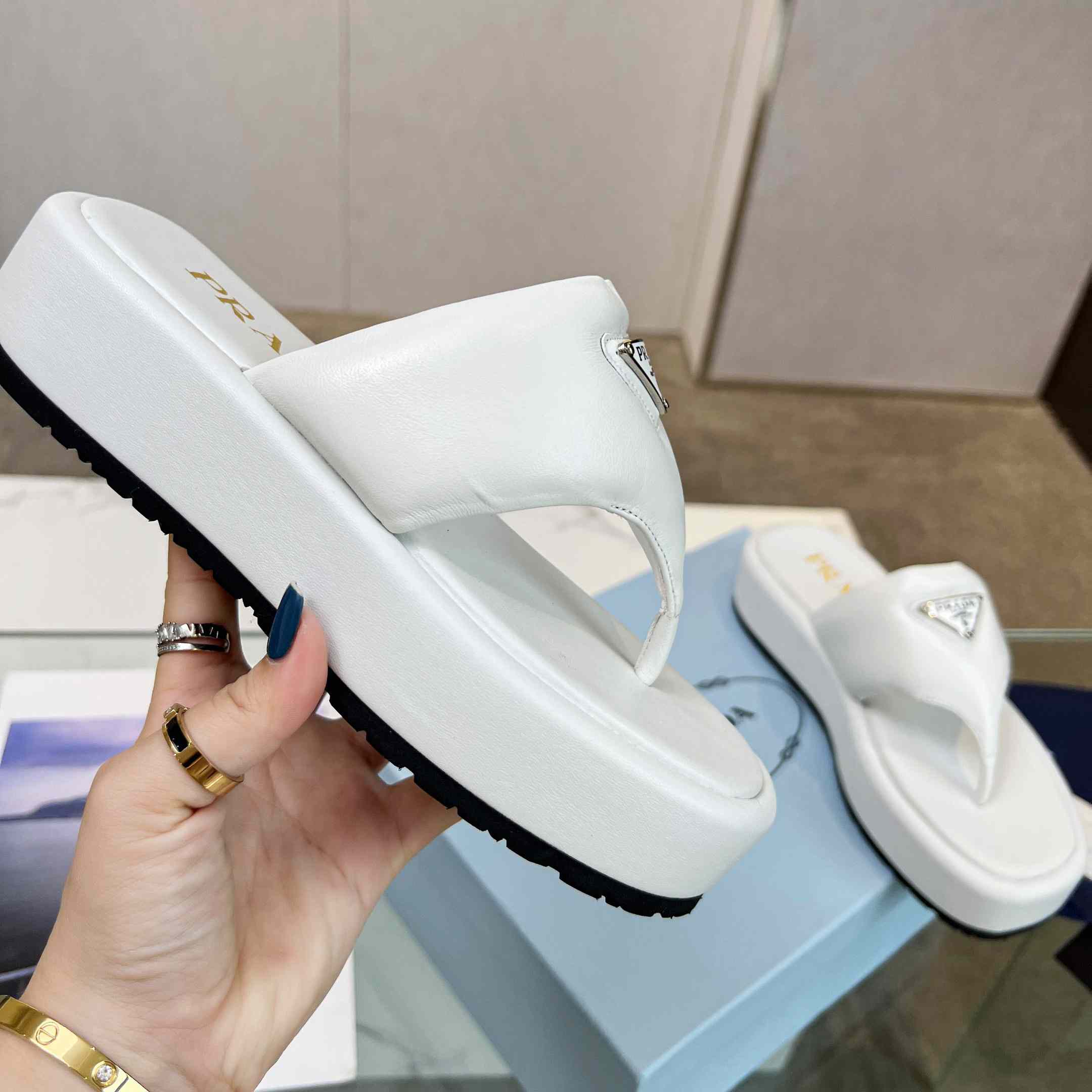 Prada Soft Padded Nappa Leather Thong Wedge Sandals - FashionPlug