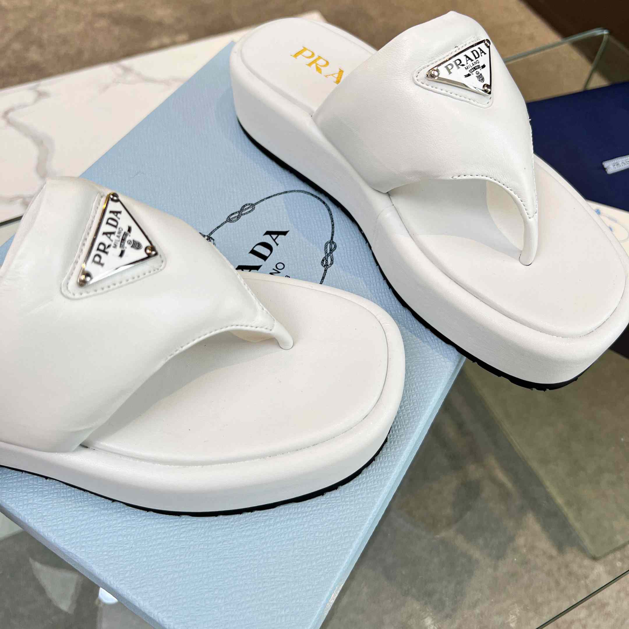 Prada Soft Padded Nappa Leather Thong Wedge Sandals - FashionPlug