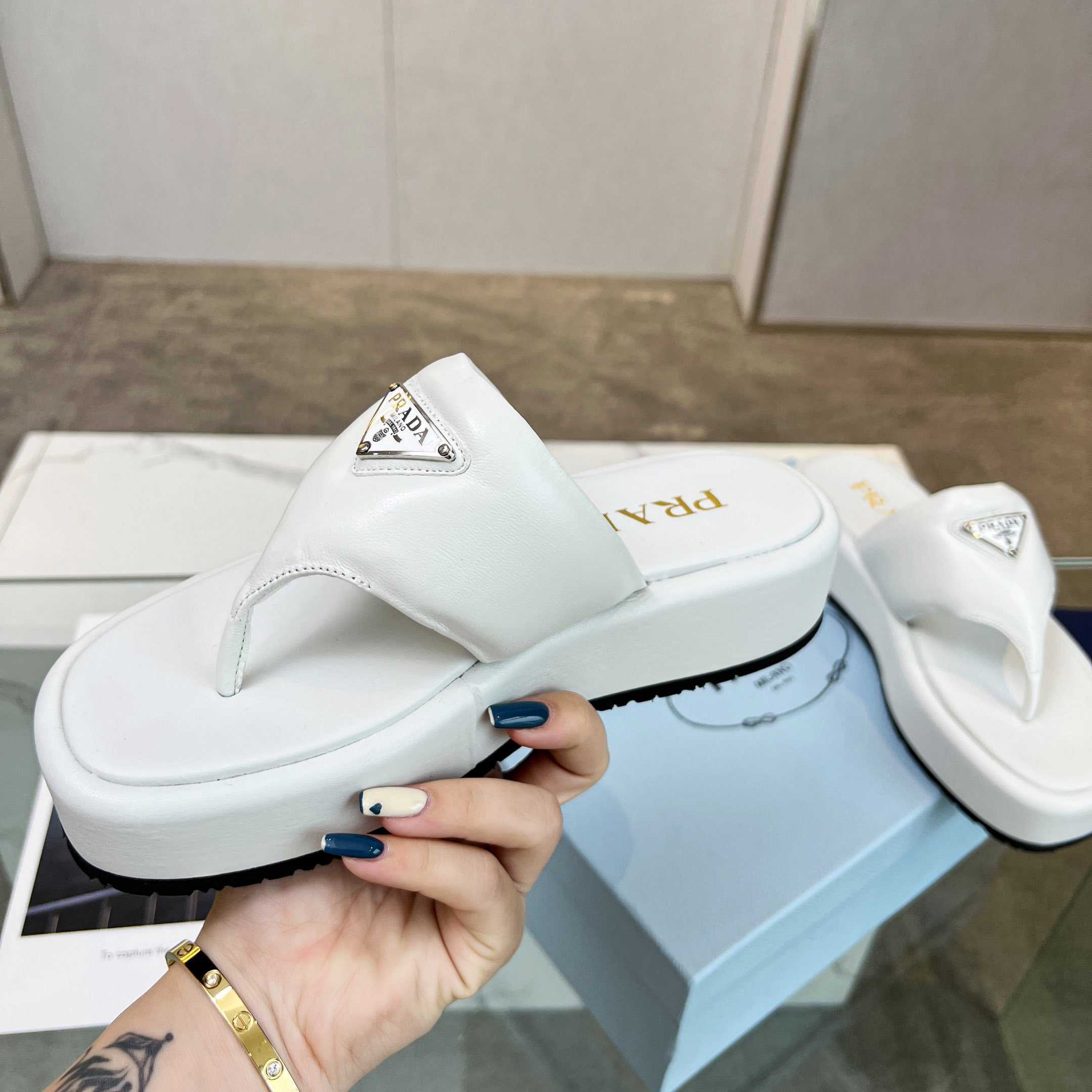 Prada Soft Padded Nappa Leather Thong Wedge Sandals - FashionPlug