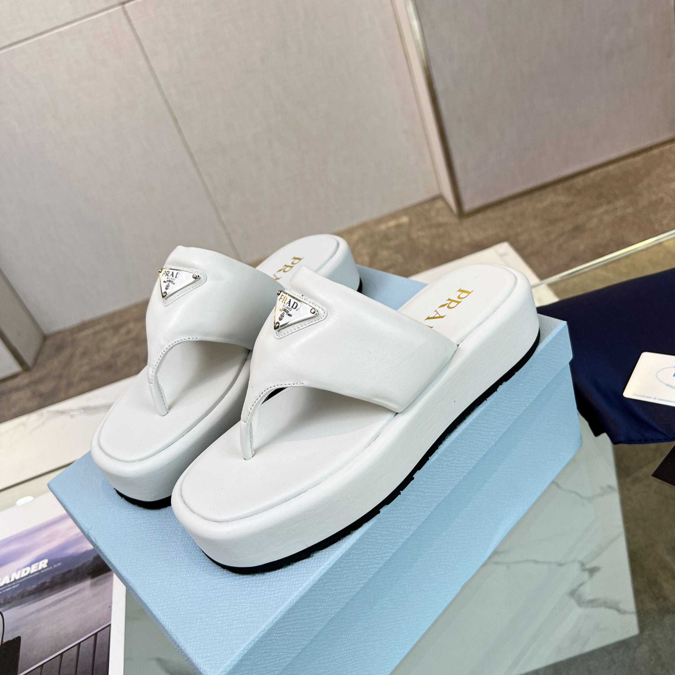 Prada Soft Padded Nappa Leather Thong Wedge Sandals - FashionPlug