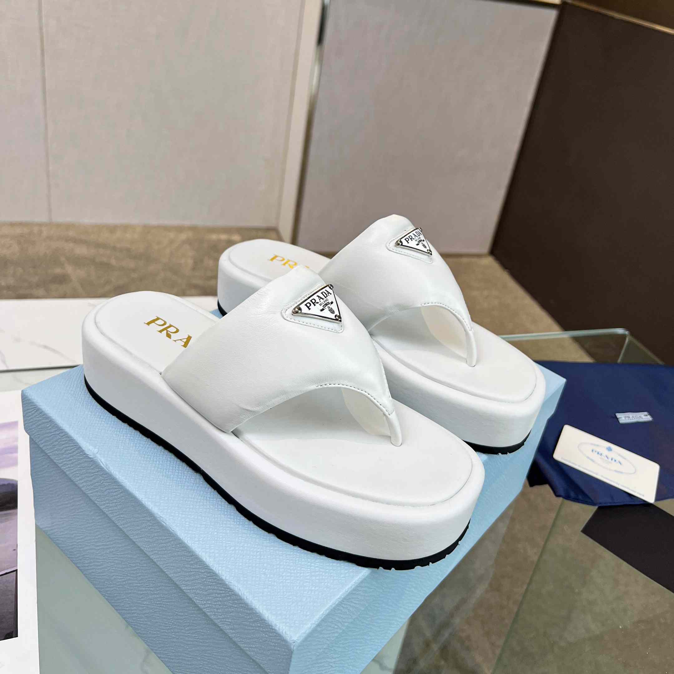 Prada Soft Padded Nappa Leather Thong Wedge Sandals - FashionPlug