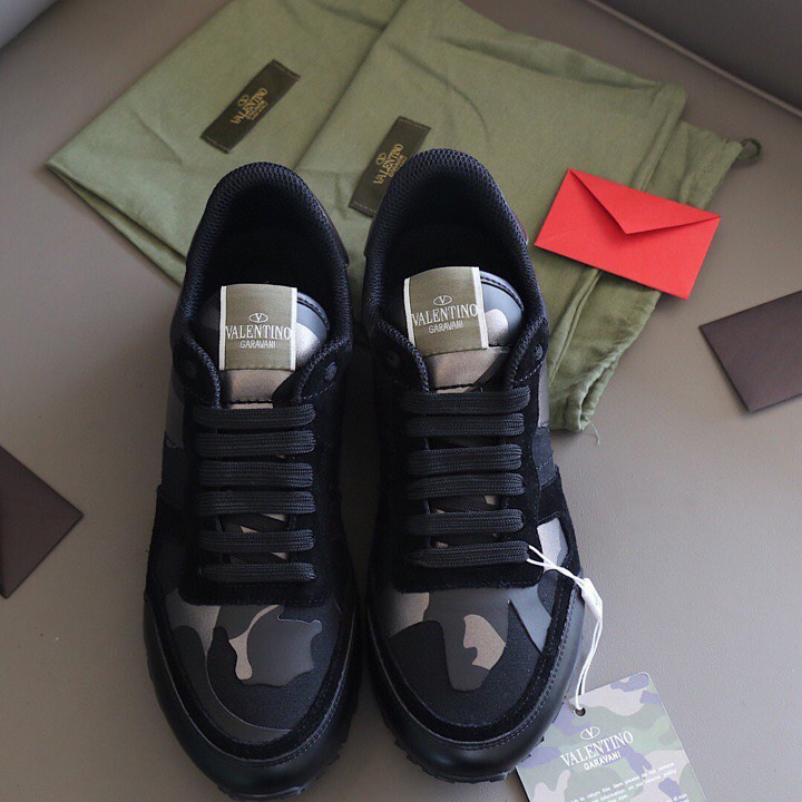 Valenti Garavani Black Rockrunner Sneakers - FashionPlug