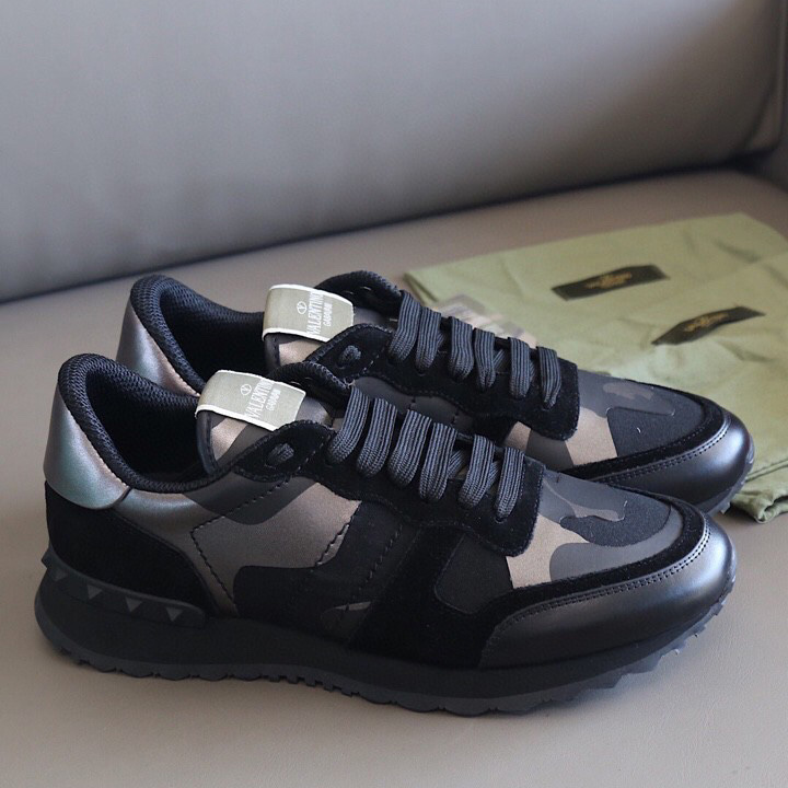 Valenti Garavani Black Rockrunner Sneakers - FashionPlug