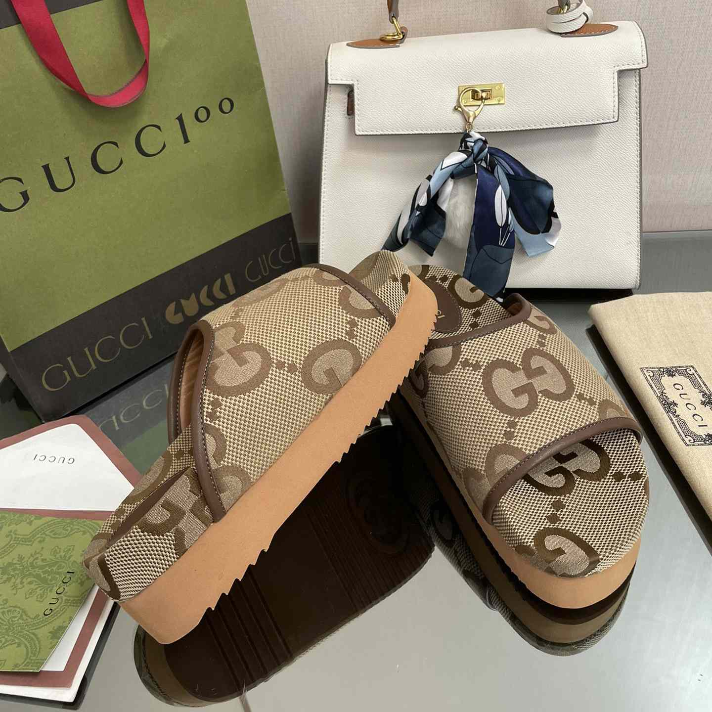 Gucci Women's Jumbo GG Platform Slide - FashionPlug