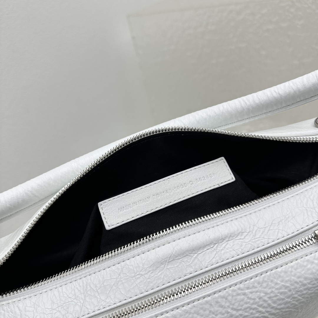 Balenciaga Raver Medium Bag With Handle In White - FashionPlug