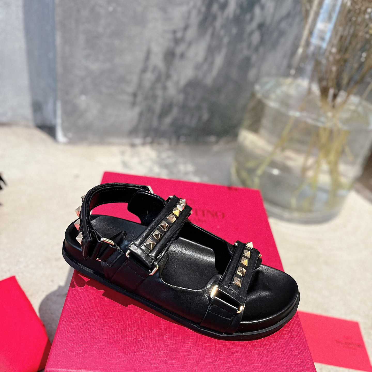 Valenti  Garavani Rockstud Flat Sandal In Nappa Leather - FashionPlug