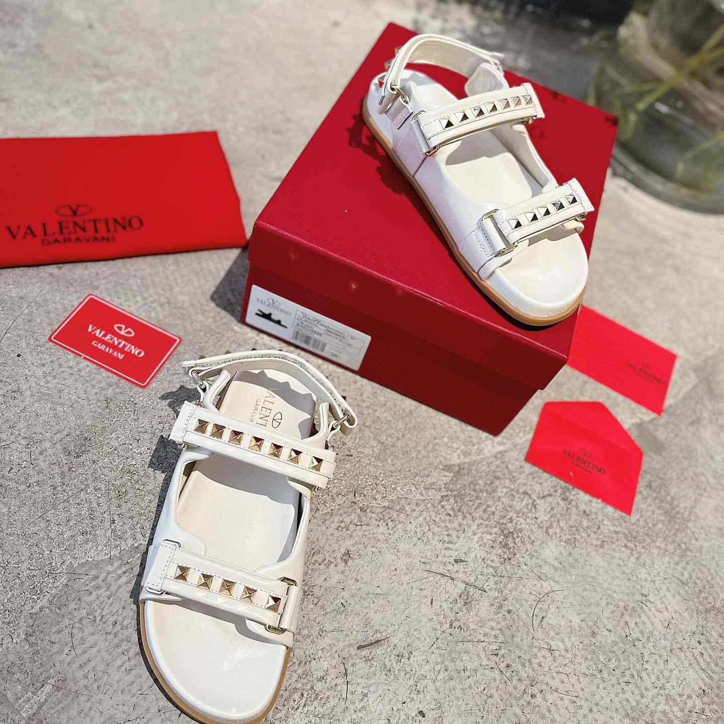 Valenti Garavani Rockstud Flat Sandal In Nappa Leather - FashionPlug
