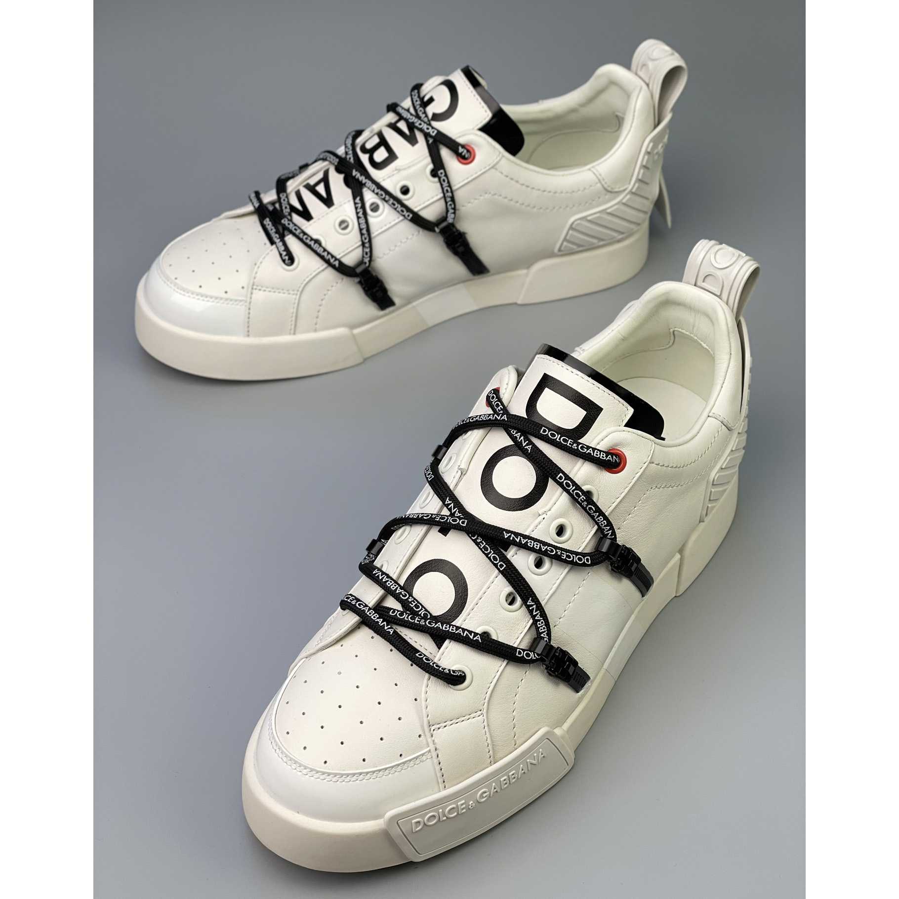 Dolce & Gabbana Portofino Sneakers In Calfskin And Patent Leather - FashionPlug