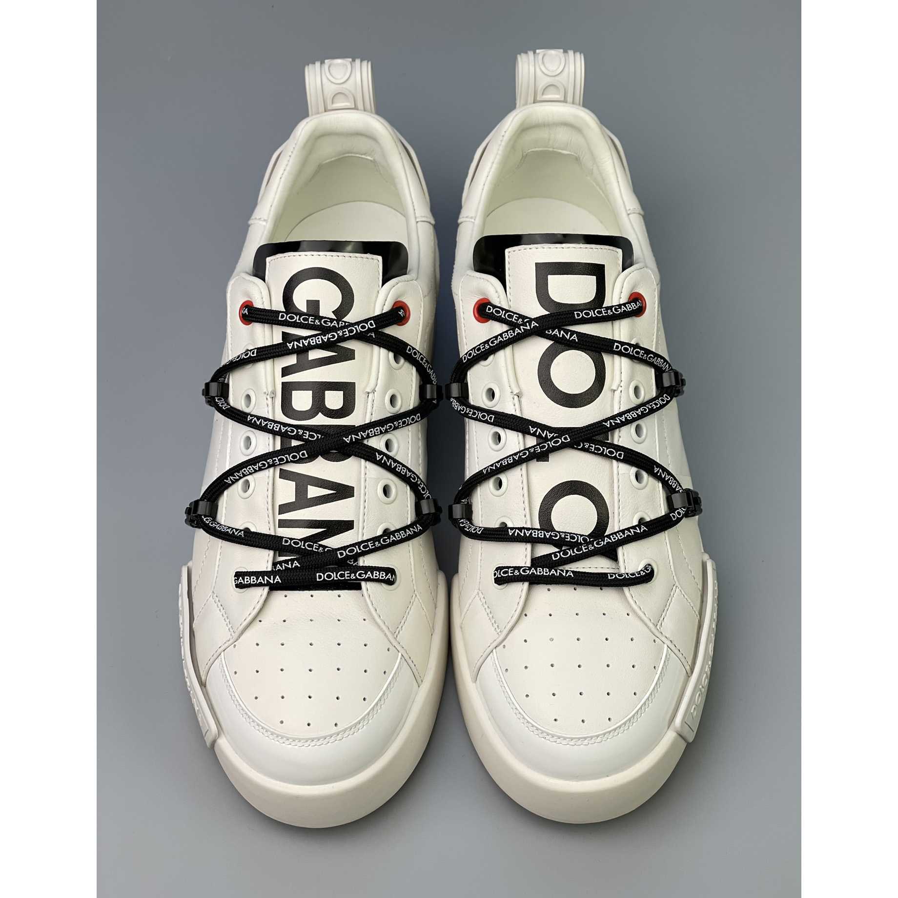 Dolce & Gabbana Portofino Sneakers In Calfskin And Patent Leather - FashionPlug
