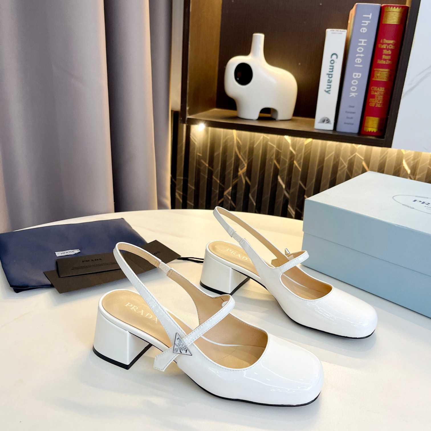 Prada Triangle Logo Leather Slingback Pumps - FashionPlug