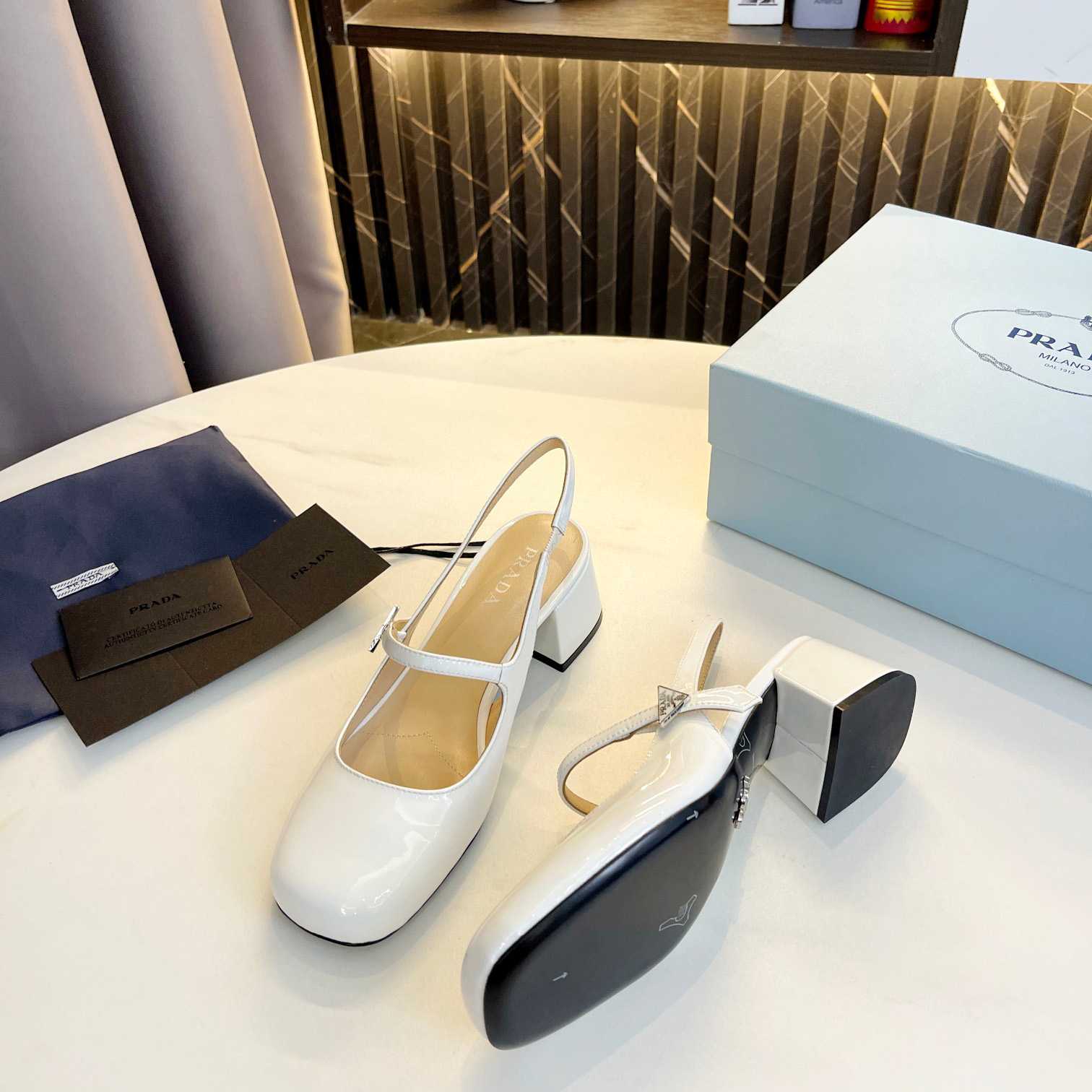Prada Triangle Logo Leather Slingback Pumps - FashionPlug