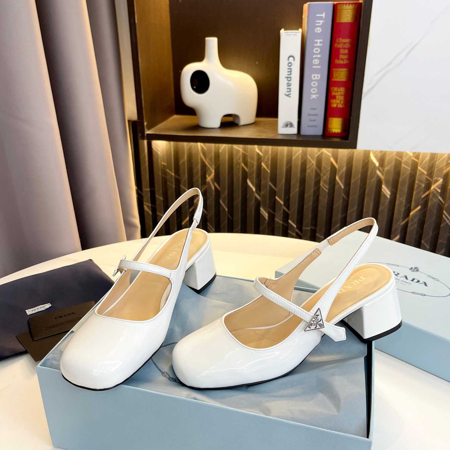 Prada Triangle Logo Leather Slingback Pumps - FashionPlug