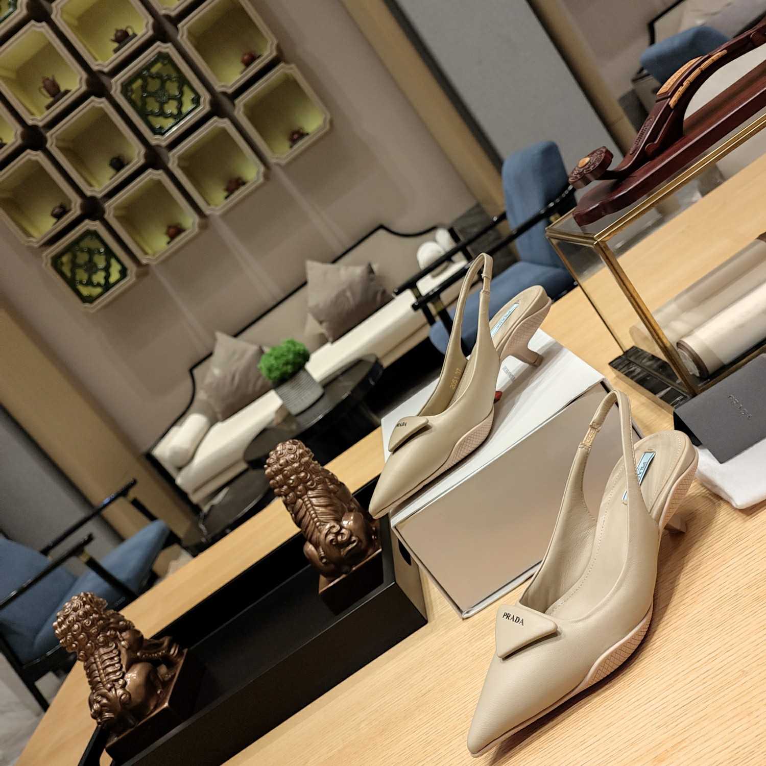 Prada Soft padded Leather Slingback Pumps - FashionPlug