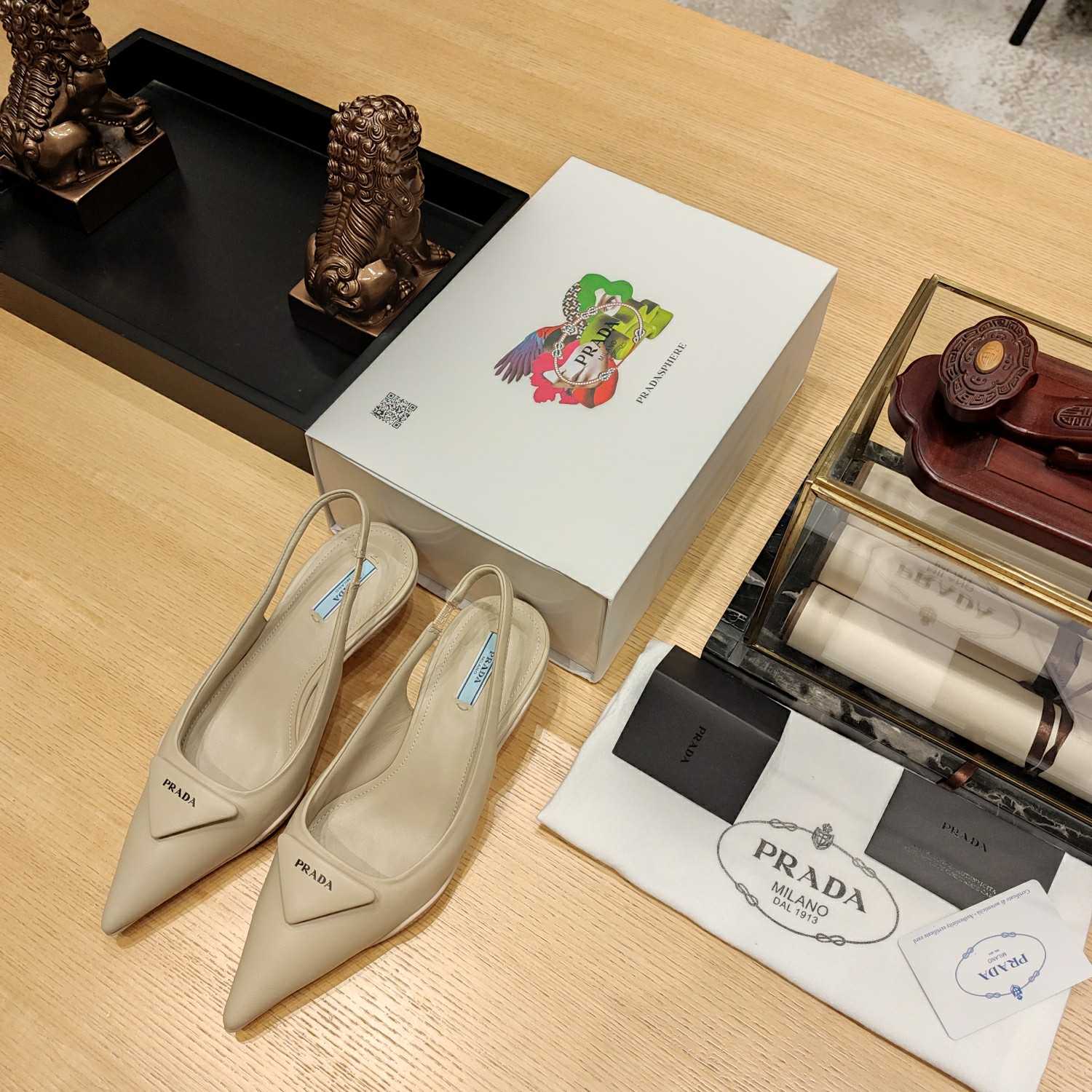 Prada Soft padded Leather Slingback Pumps - FashionPlug