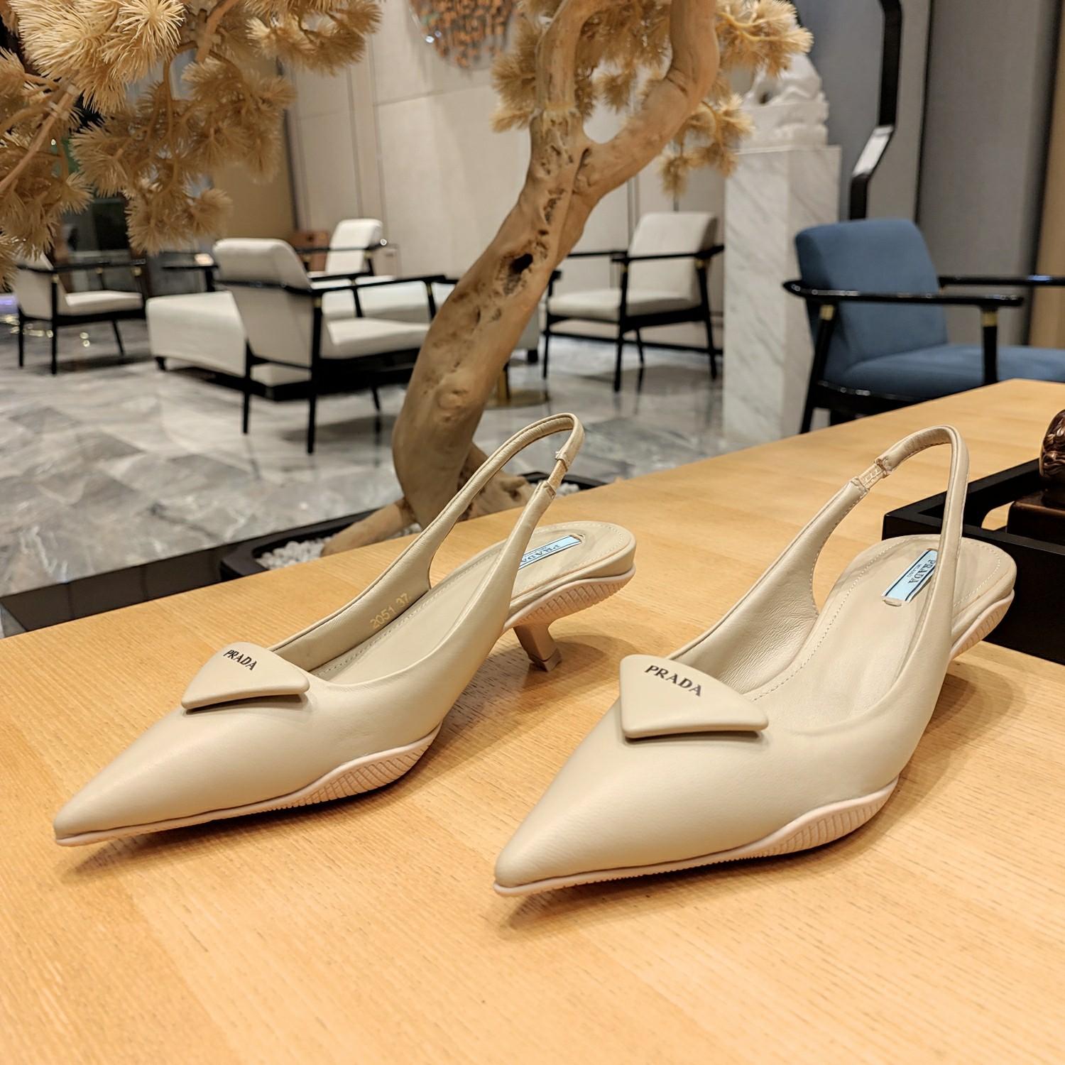 Prada Soft padded Leather Slingback Pumps - FashionPlug