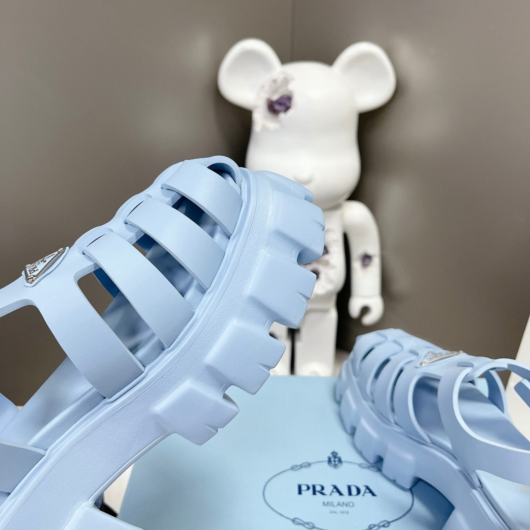Prada Women's Light-blue Rubber Sandals - FashionPlug