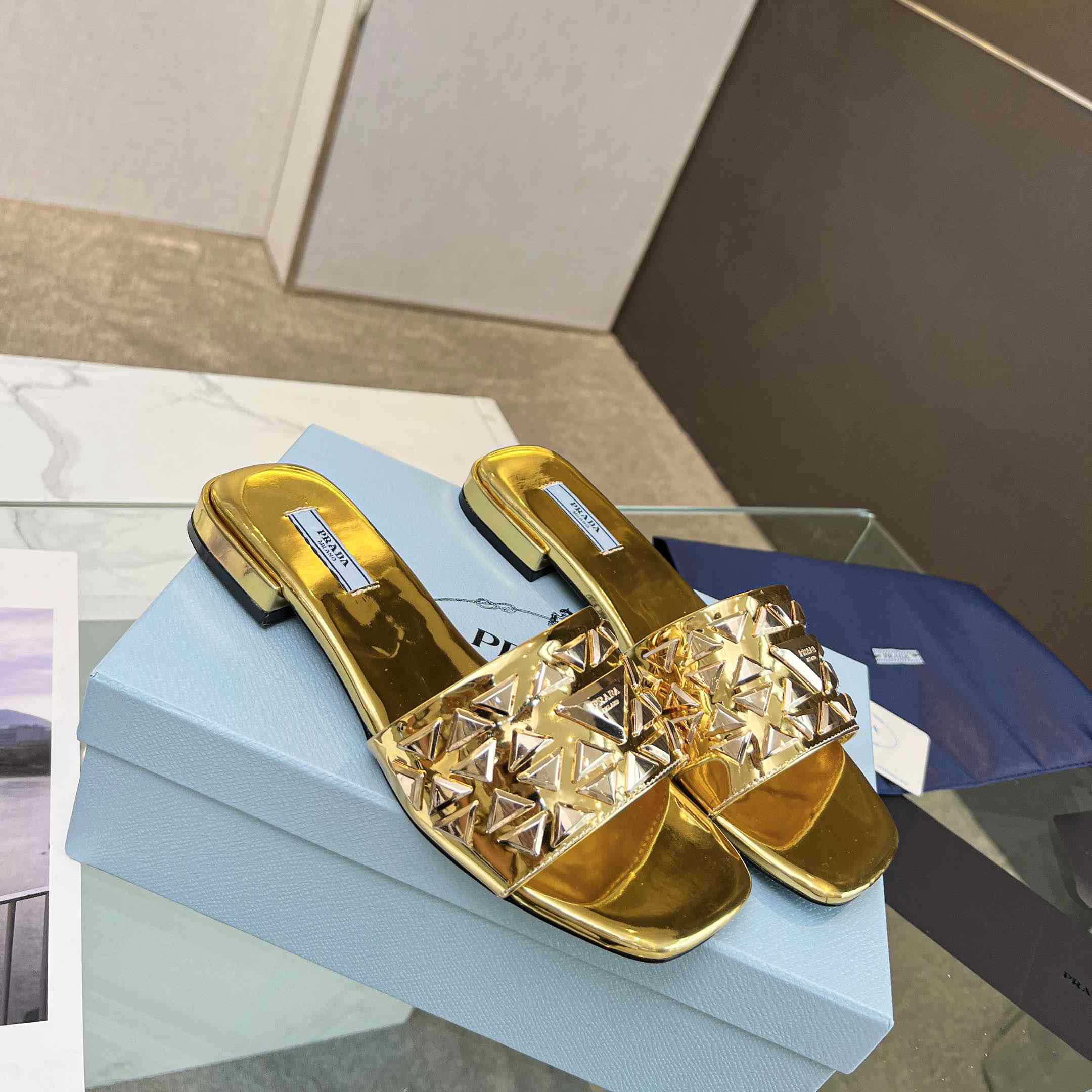 Prada Studded Metallic Leather Slides - FashionPlug
