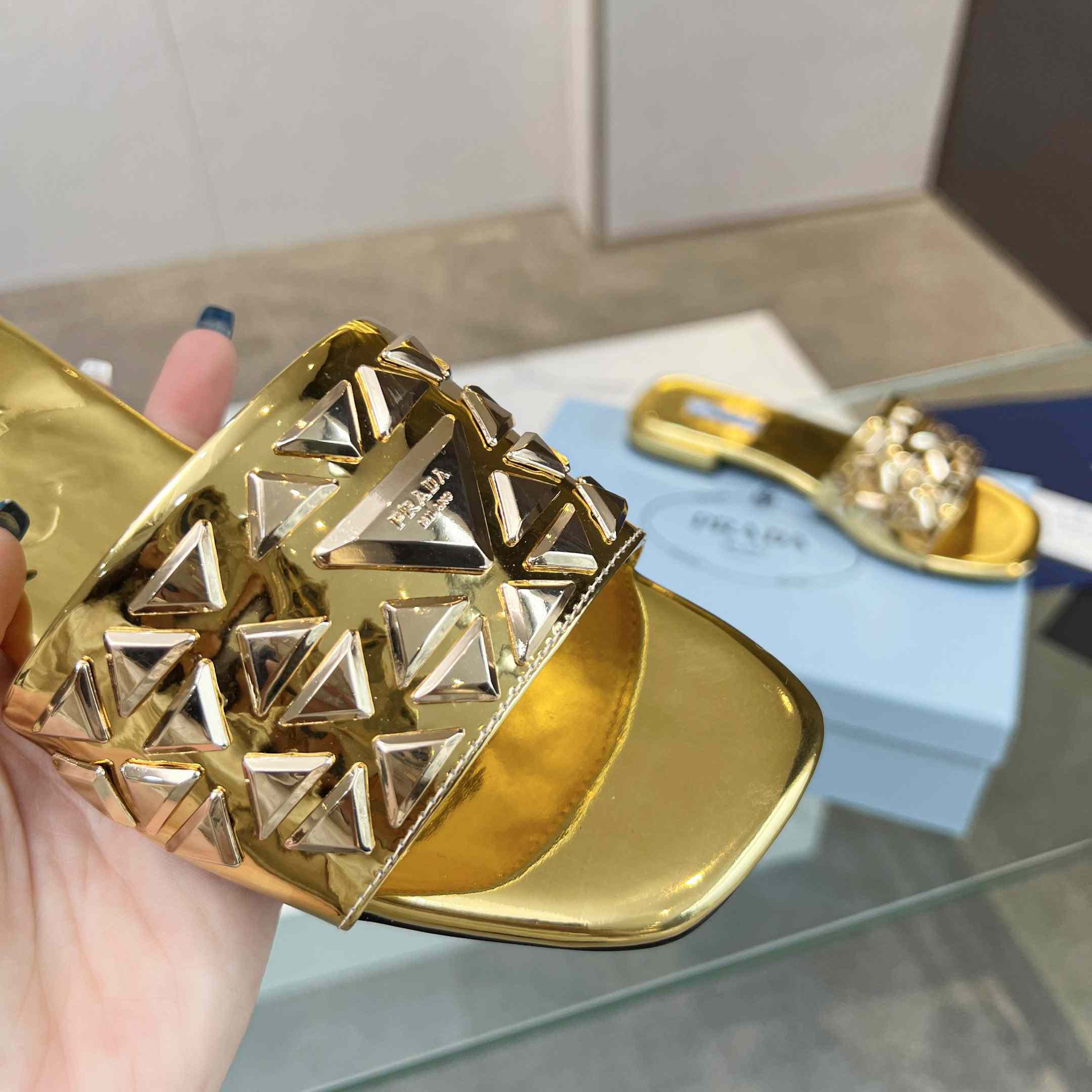 Prada Studded Metallic Leather Slides - FashionPlug