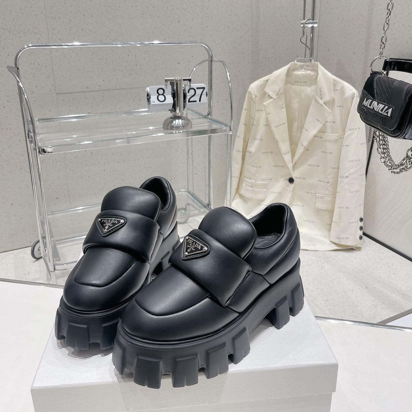 Prada Soft padded Nappa Leather Loafers - FashionPlug