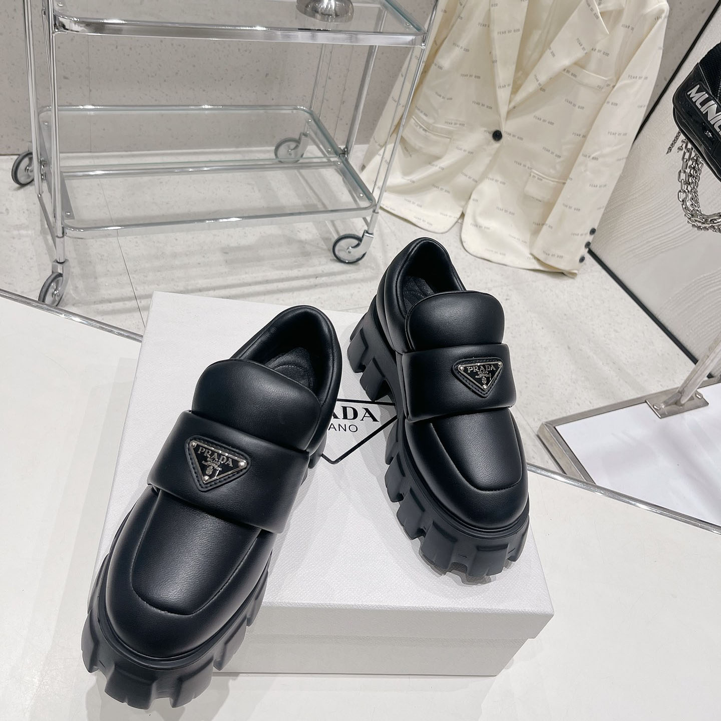 Prada Soft padded Nappa Leather Loafers - FashionPlug