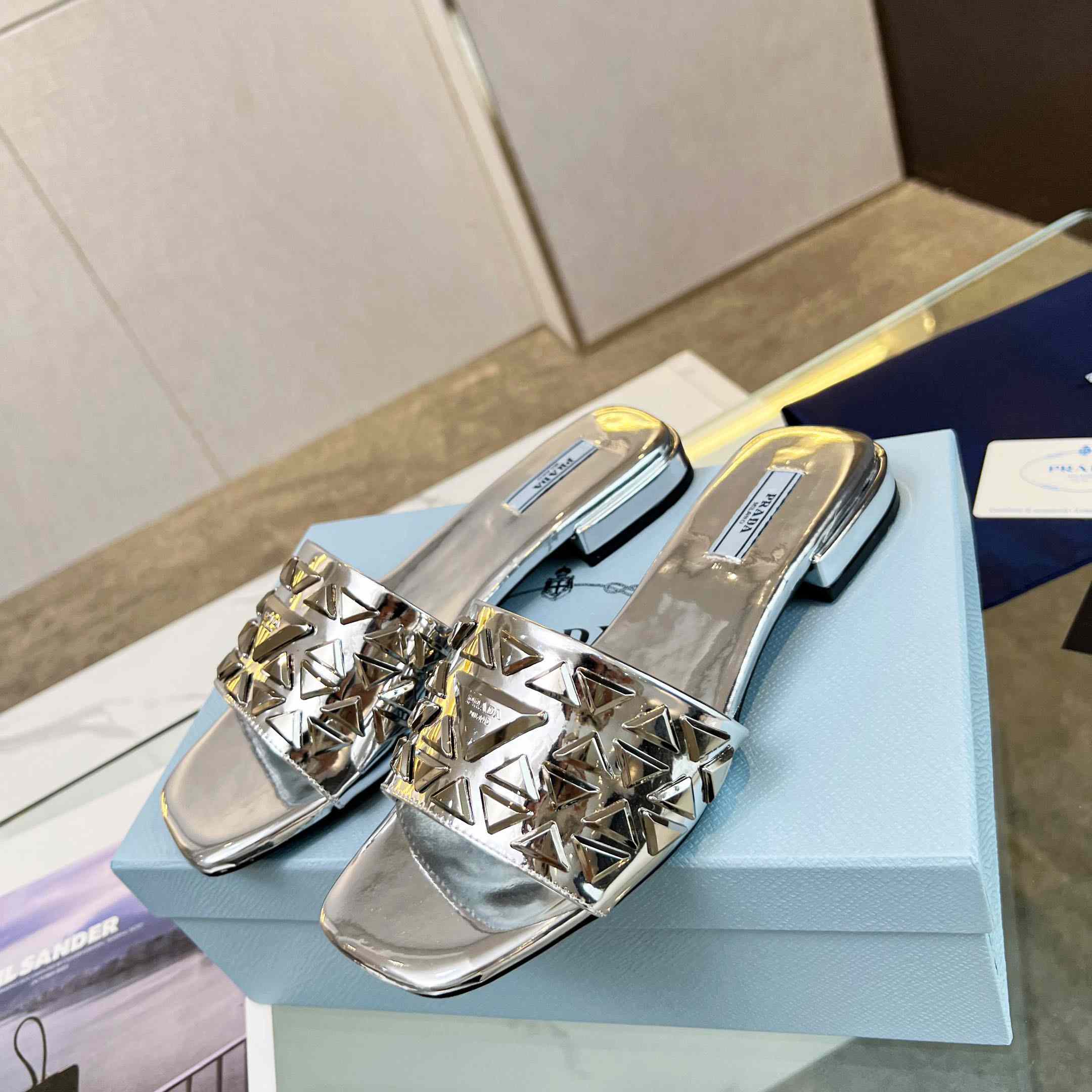 Prada Studded Metallic Leather Slides - FashionPlug