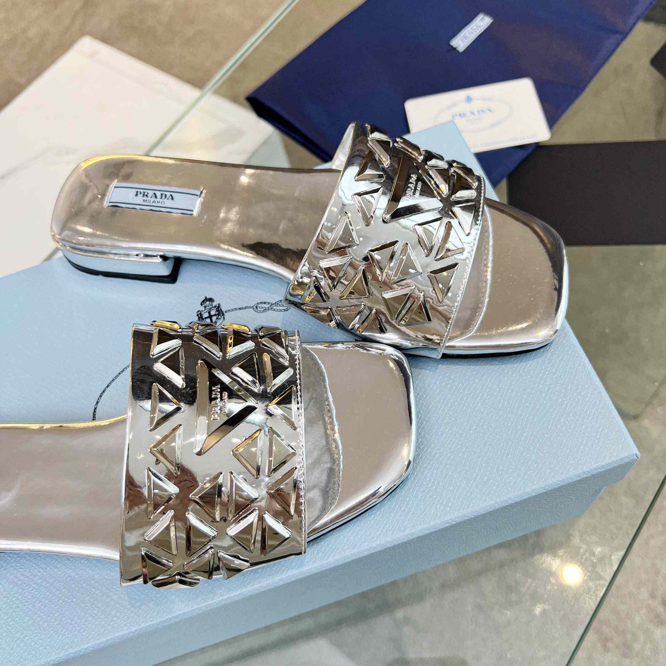 Prada Studded Metallic Leather Slides - FashionPlug